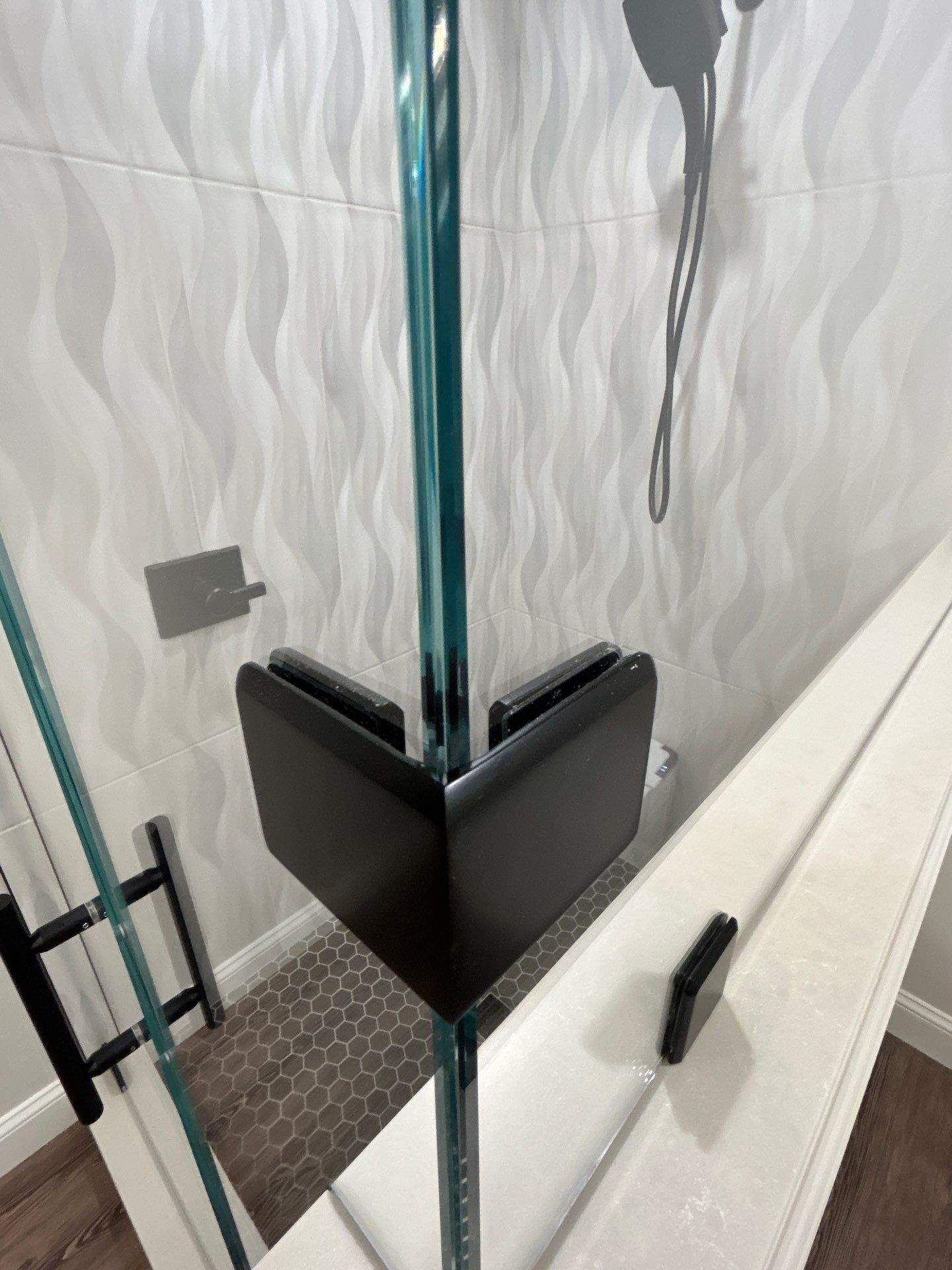 Frameless Shower Enclosure w/Header Bar by Cheshire Glass Company