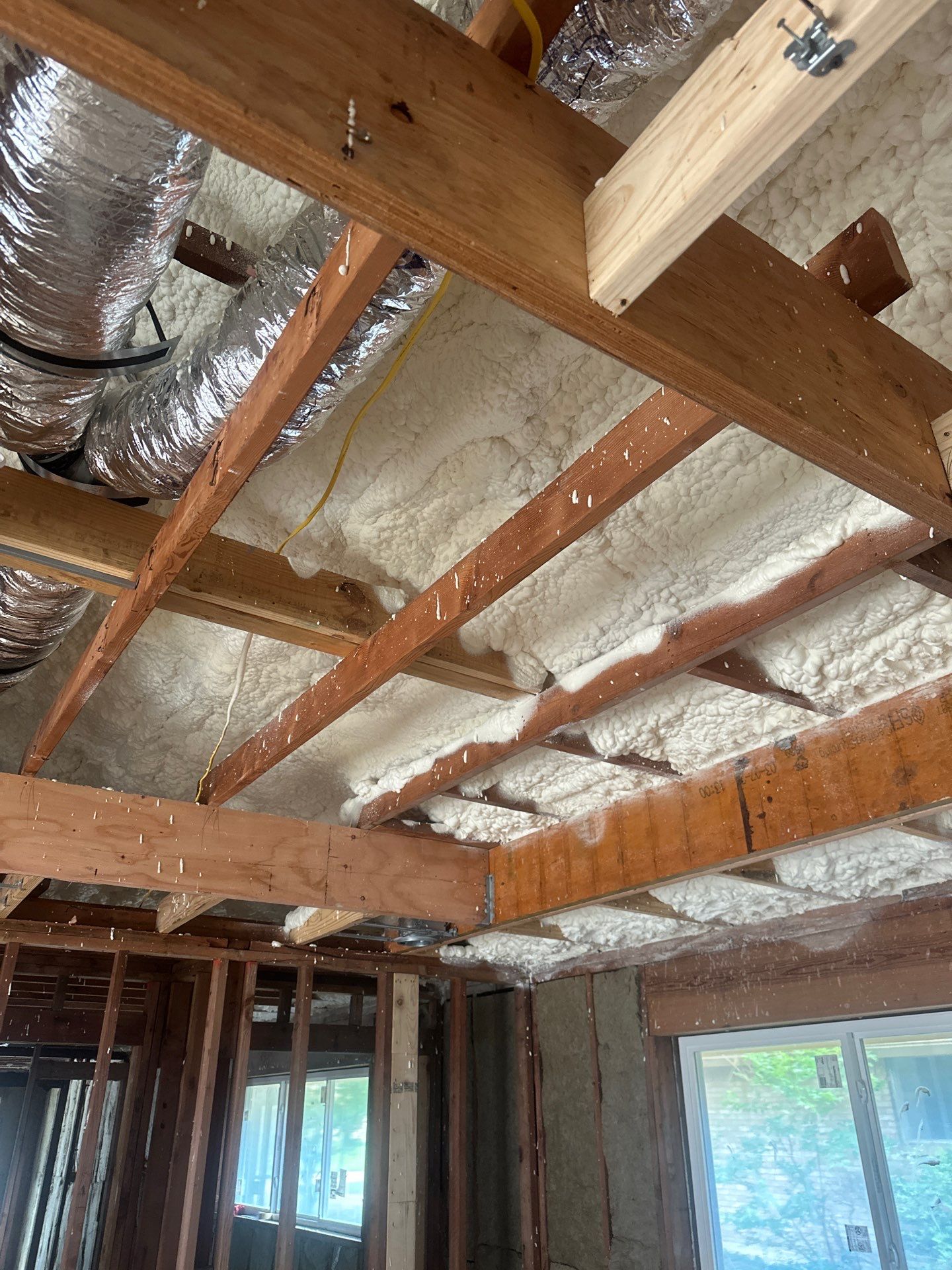 Open cell spray foam & rockwool job completed in Dallas TX by Apex Insulation Solutions