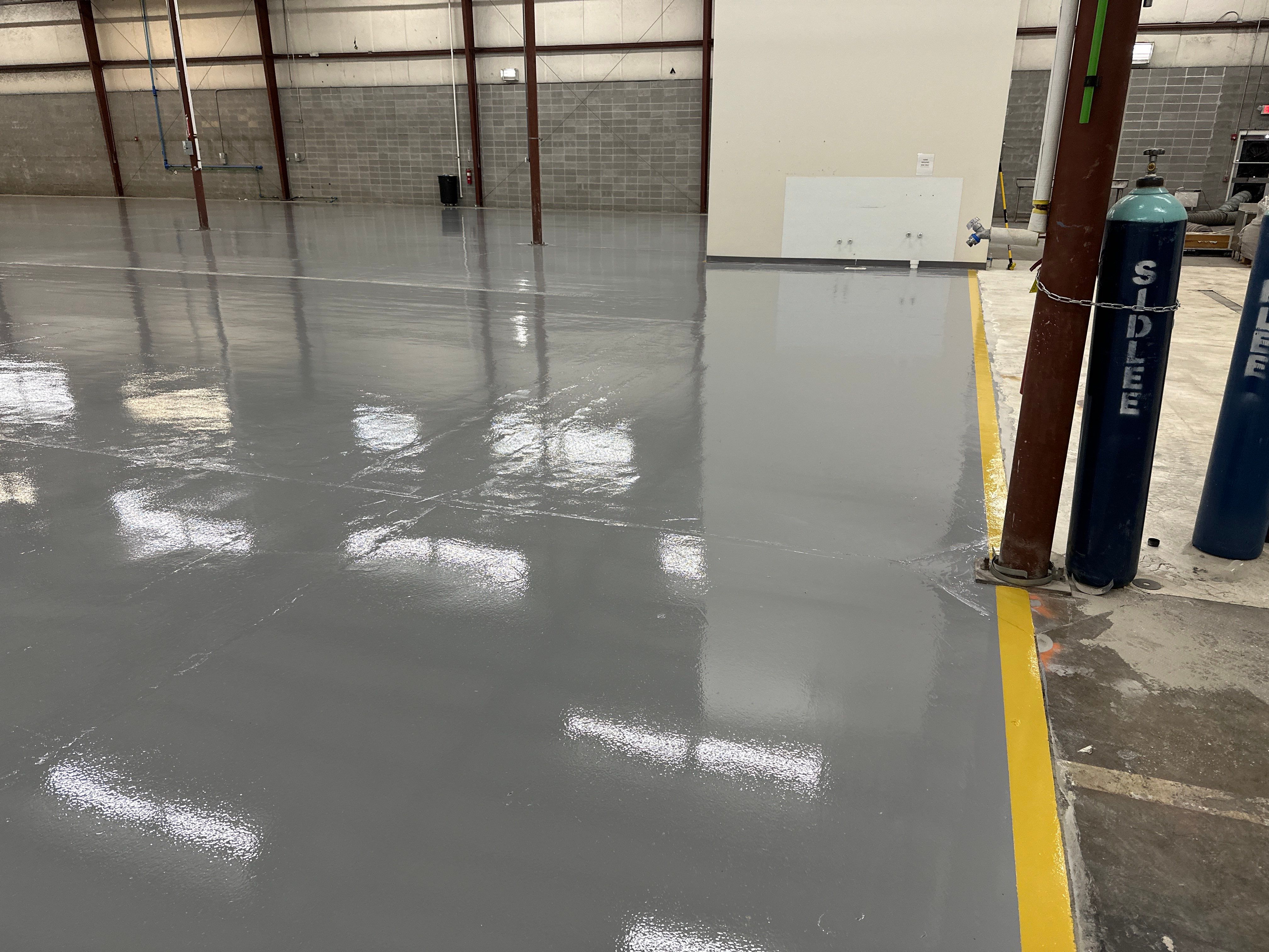 High-Gloss Industrial Epoxy Flooring Installation in Tucker, Georgia by Cornerstone Hard Surface Restoration