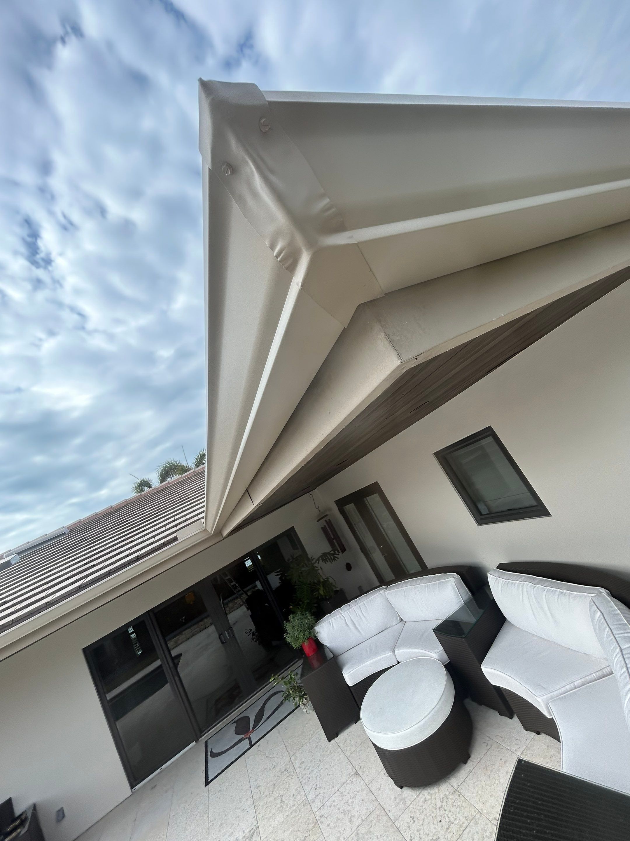 6-Inch White Seamless Gutters in Sarasota FL by Gutter Professors
