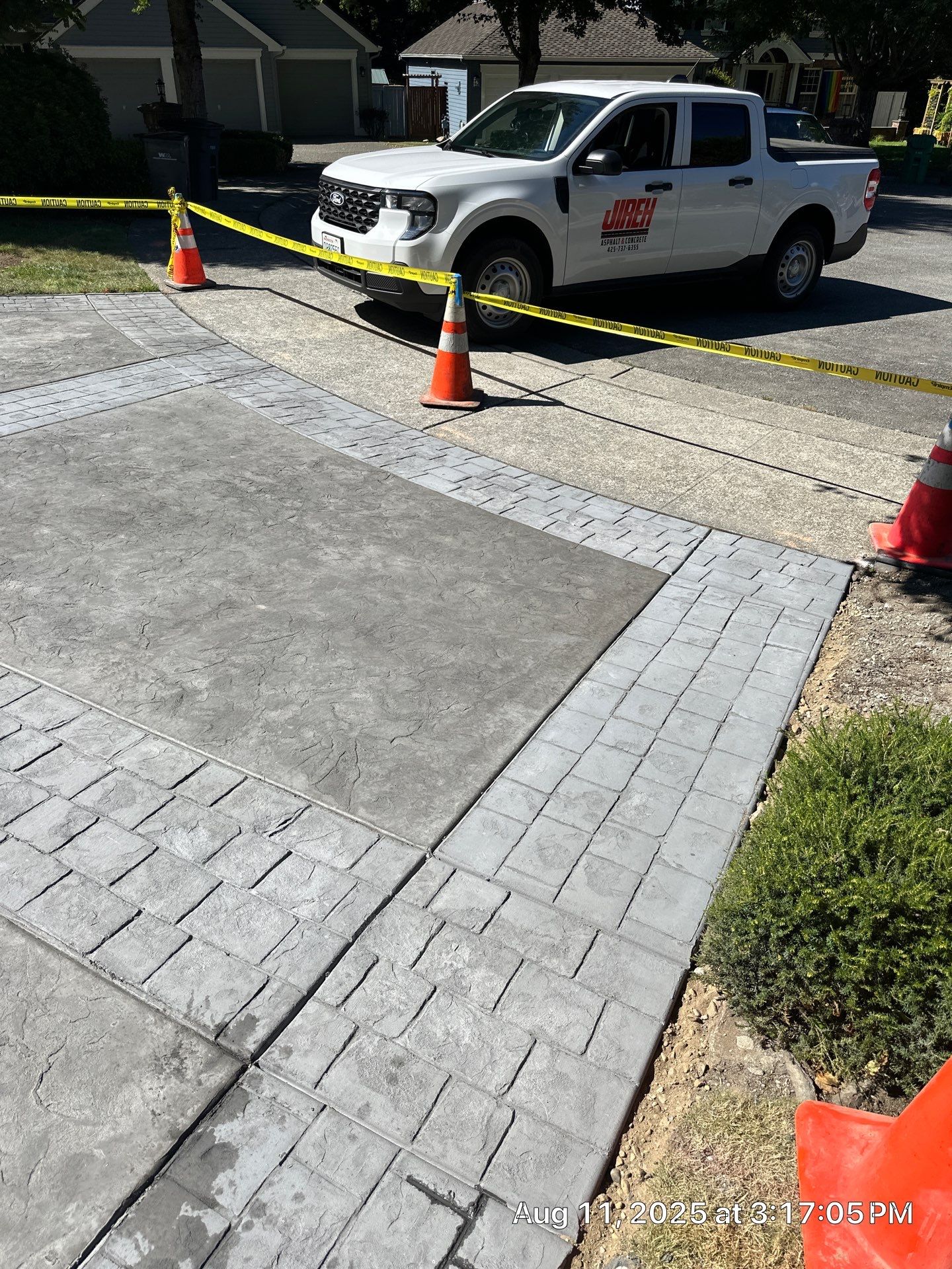 Multi-color Stamped & Sealed Concrete Driveway Renovation | Mukilteo by Jireh Asphalt & Concrete Inc