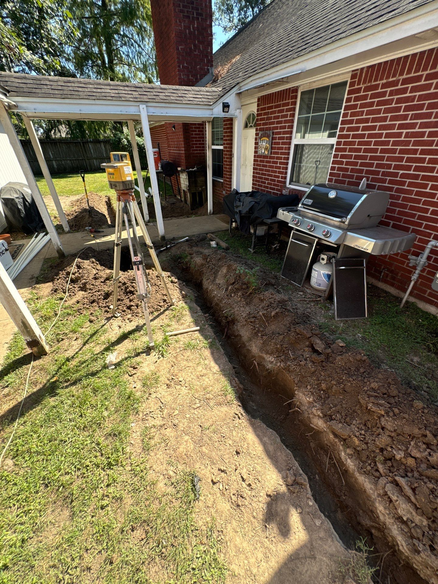 🌿 Rodney – Full Gutters, Drainage System, Flagstone Patio & Pergola  Alejandro and the Texas Urban Elements Team recently completed a multi-solution project for Rodney’s home, blending function with design.  ✅ Seamless Gutters We installed a complete 6” seamless gutter system around the home to properly redirect rainwater away from the foundation, protecting siding, paint, and landscaping while boosting curb appeal.  ✅ Drainage System A new PVC storm drainage system was integrated into the gutters and extended to carry roof runoff away from the house. This ensures water won’t pool near the foundation or the new patio area.  ✅ Flagstone Patio Ground We prepped, leveled, and installed a custom flagstone patio for Rodney—delivering both beauty and durability, creating a natural, timeless look that ties perfectly into the yard.  ✅ Pergola Addition To conclude, our framing team constructed a small pergola extension, providing Rodney’s patio with a shaded retreat for family and friends to enjoy.  ✨ Result: A fully protected and enhanced outdoor living space where drainage, stonework, and structure all work together for long-lasting performance and comfort.  📢 At Texas Urban Elements, we specialize in building solutions that protect homes while creating beautiful outdoor environments. by Texas Urban Elements