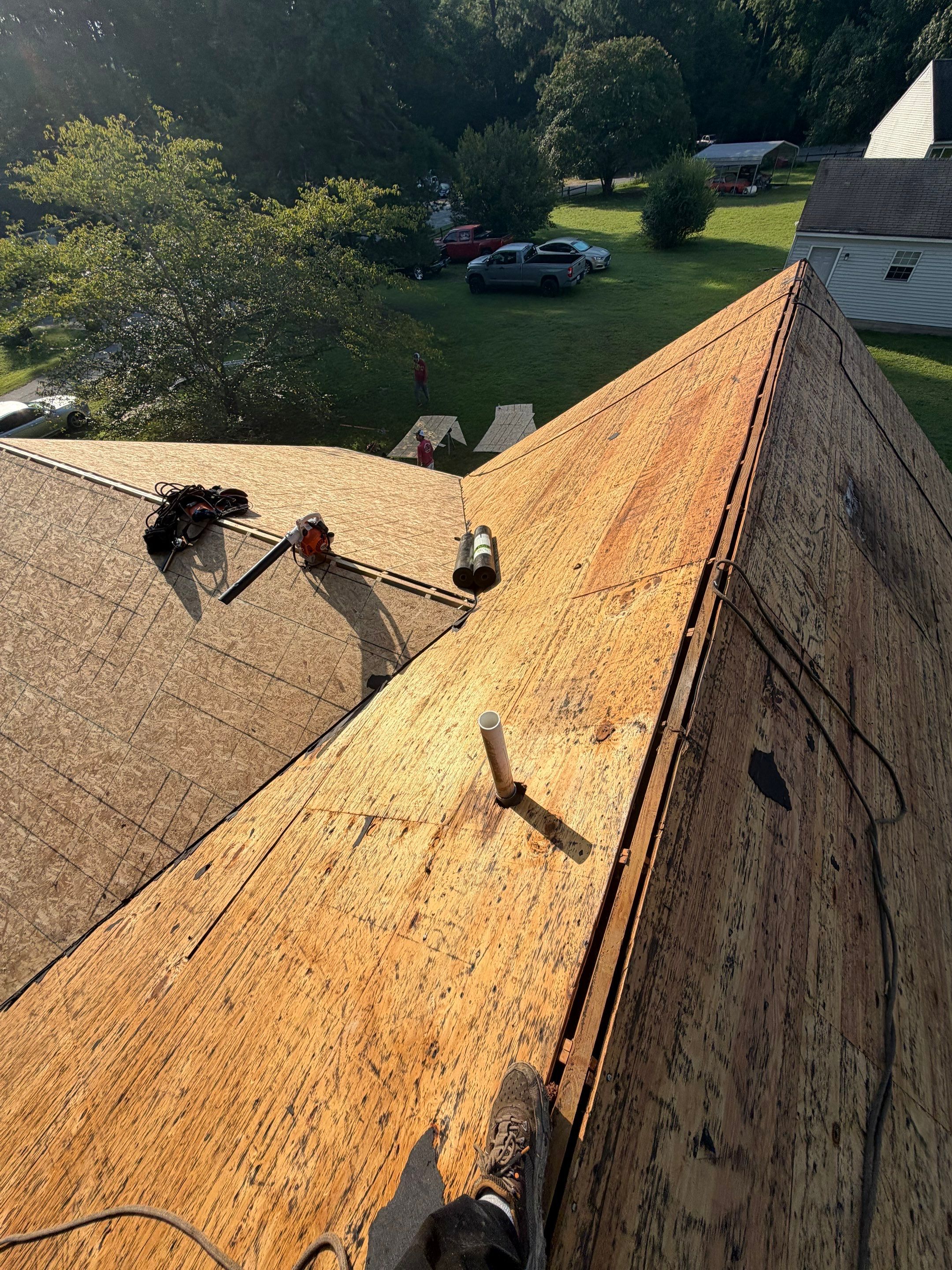 Asphalt Shingle Roof Replacement and Custom Porch Renovation in Hayes by Cade Construction