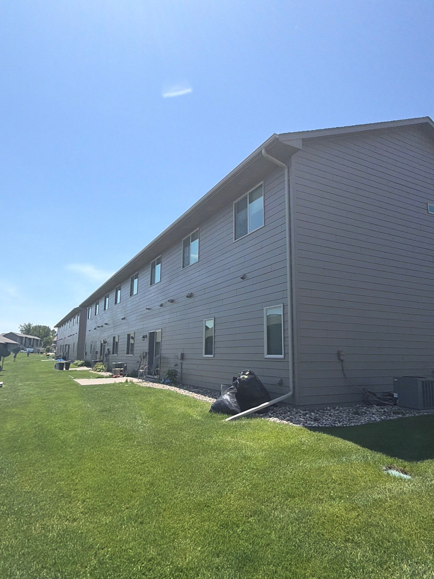 Multi-Family Exterior Painting and Trim Refresh in Sioux Falls by Select Painting, Coatings & Garage Cabinets
