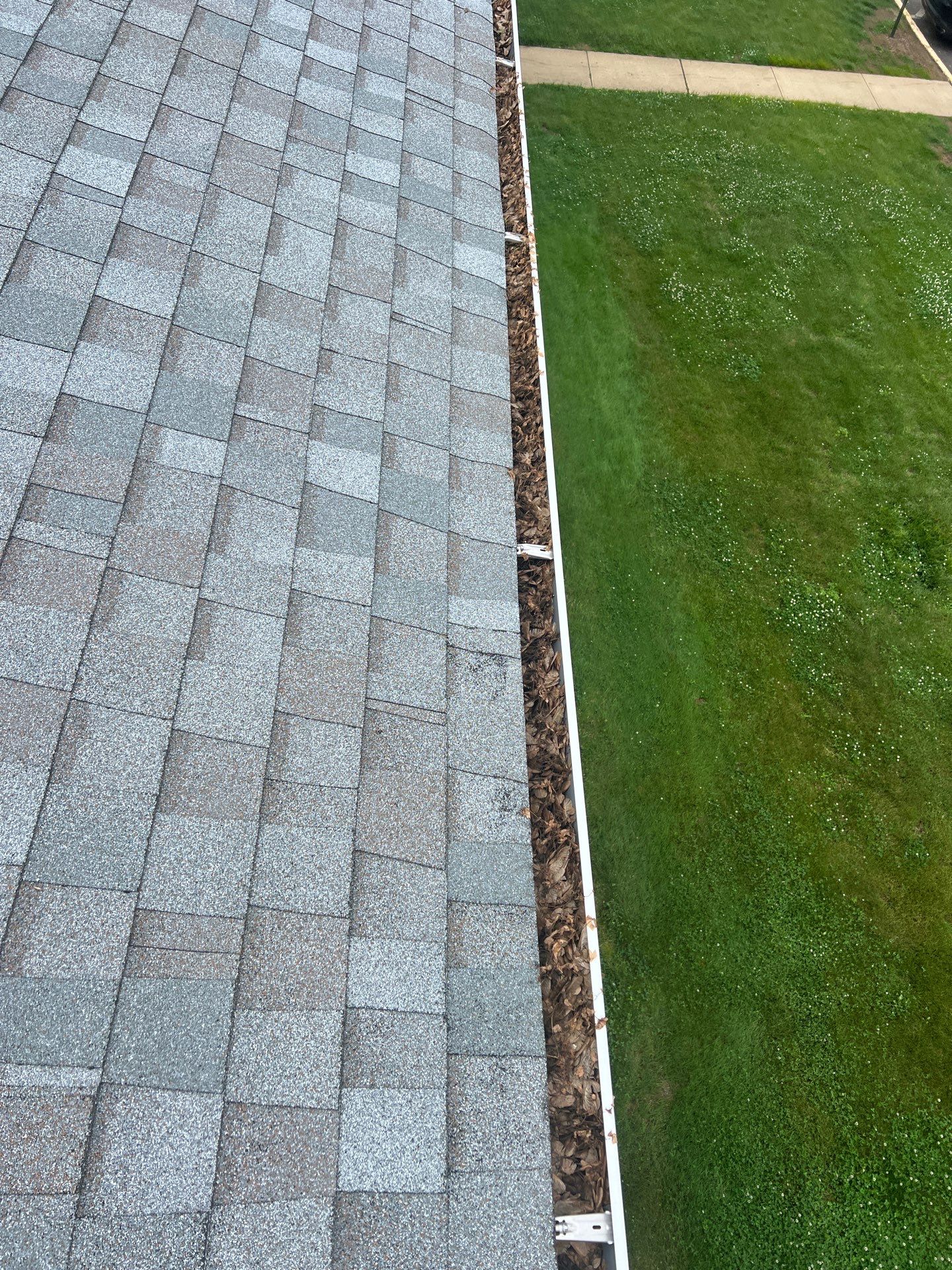 Commercial gutter cleaning Trenton, NJ before photo with filled gutters