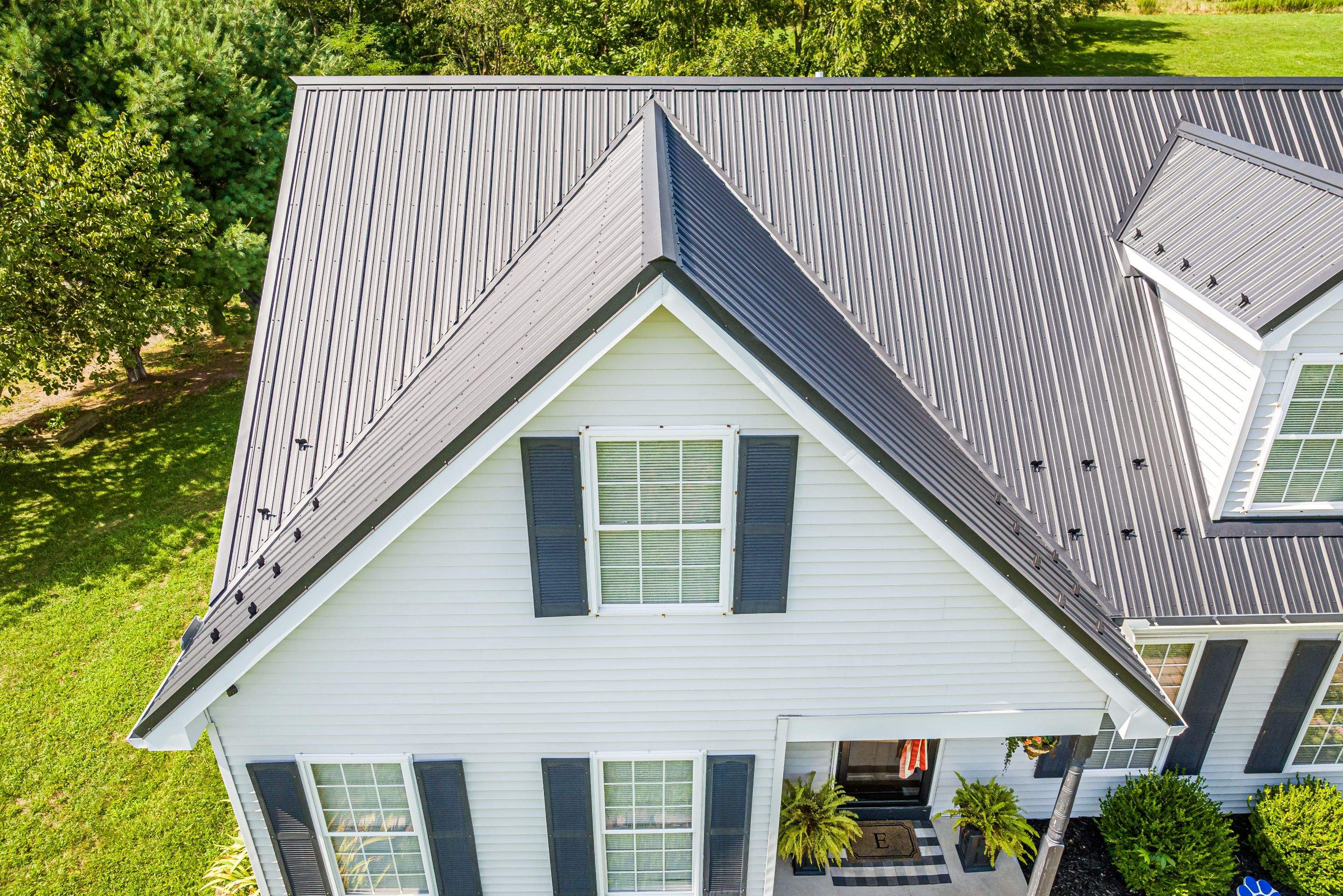 Metal roof install - black by Esh Builders