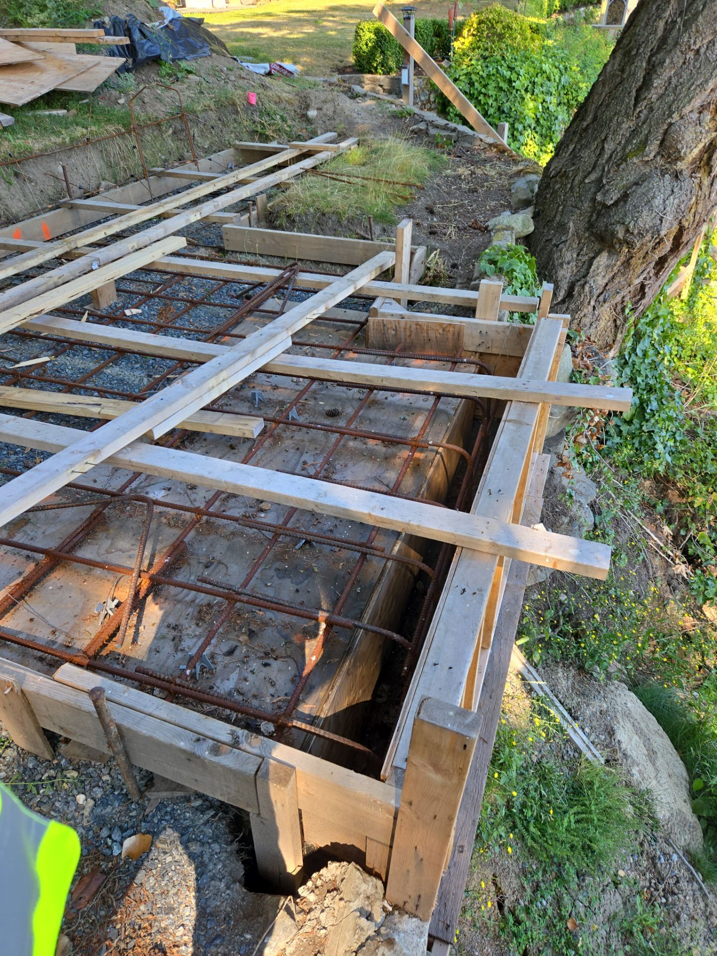 Coastal Landscape Restoration & Retaining Structure - In progress by Habanero Garden and Exterior Care