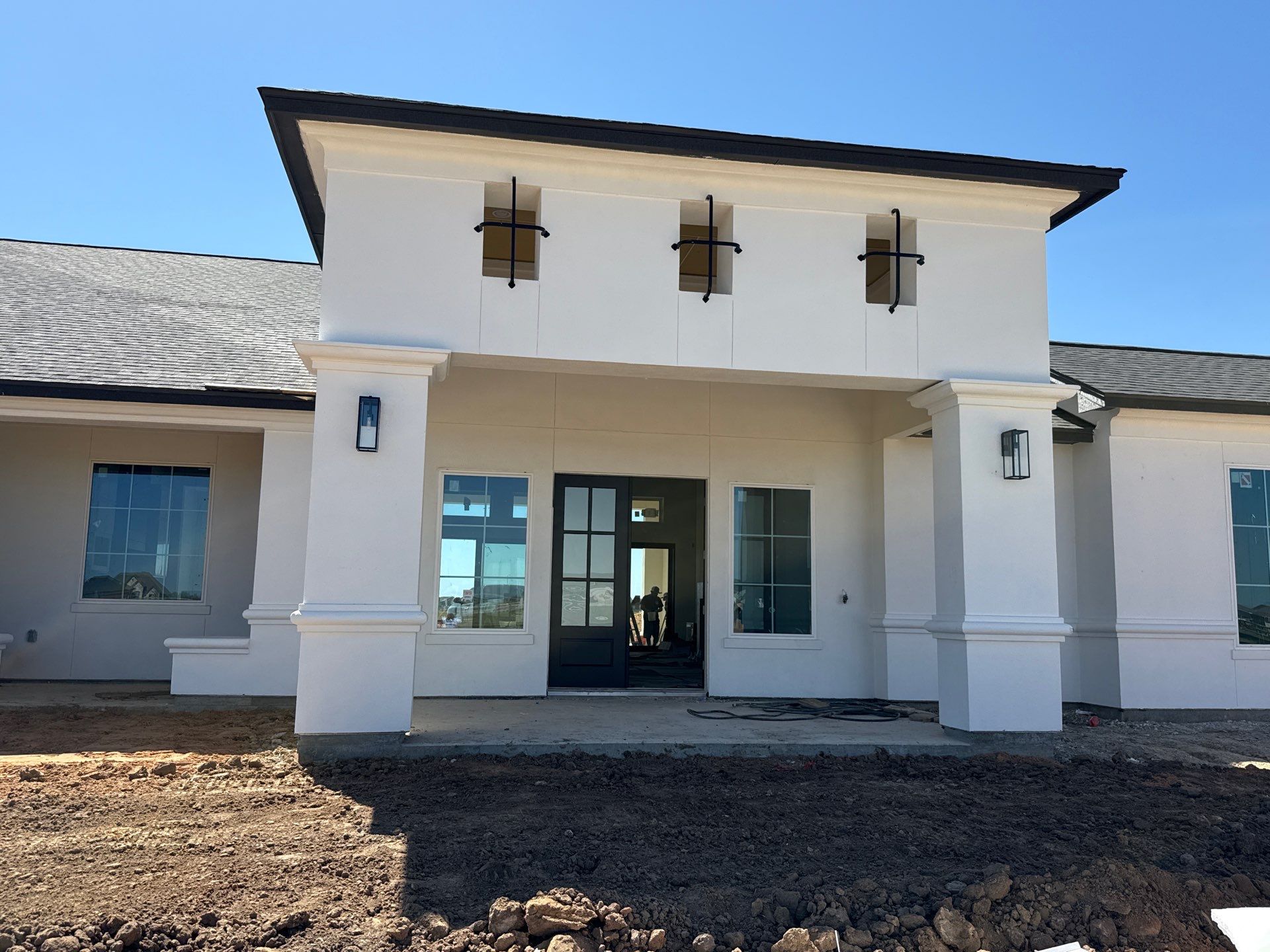 Custom Stucco Masterpiece with Precision Foam Detailing – Waller, TX by Apex Conventional Stucco Llc