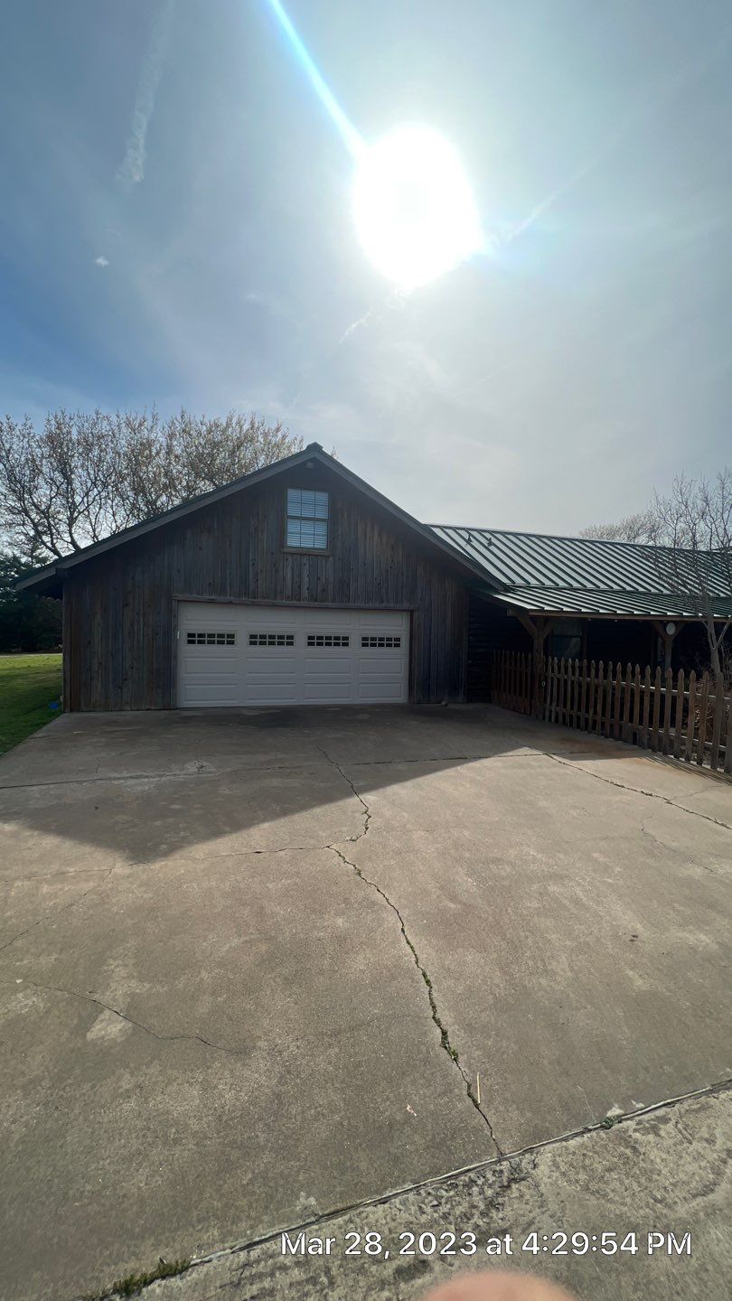 Shingle to Standing Seam Metal Roof by Springtree Restoration
