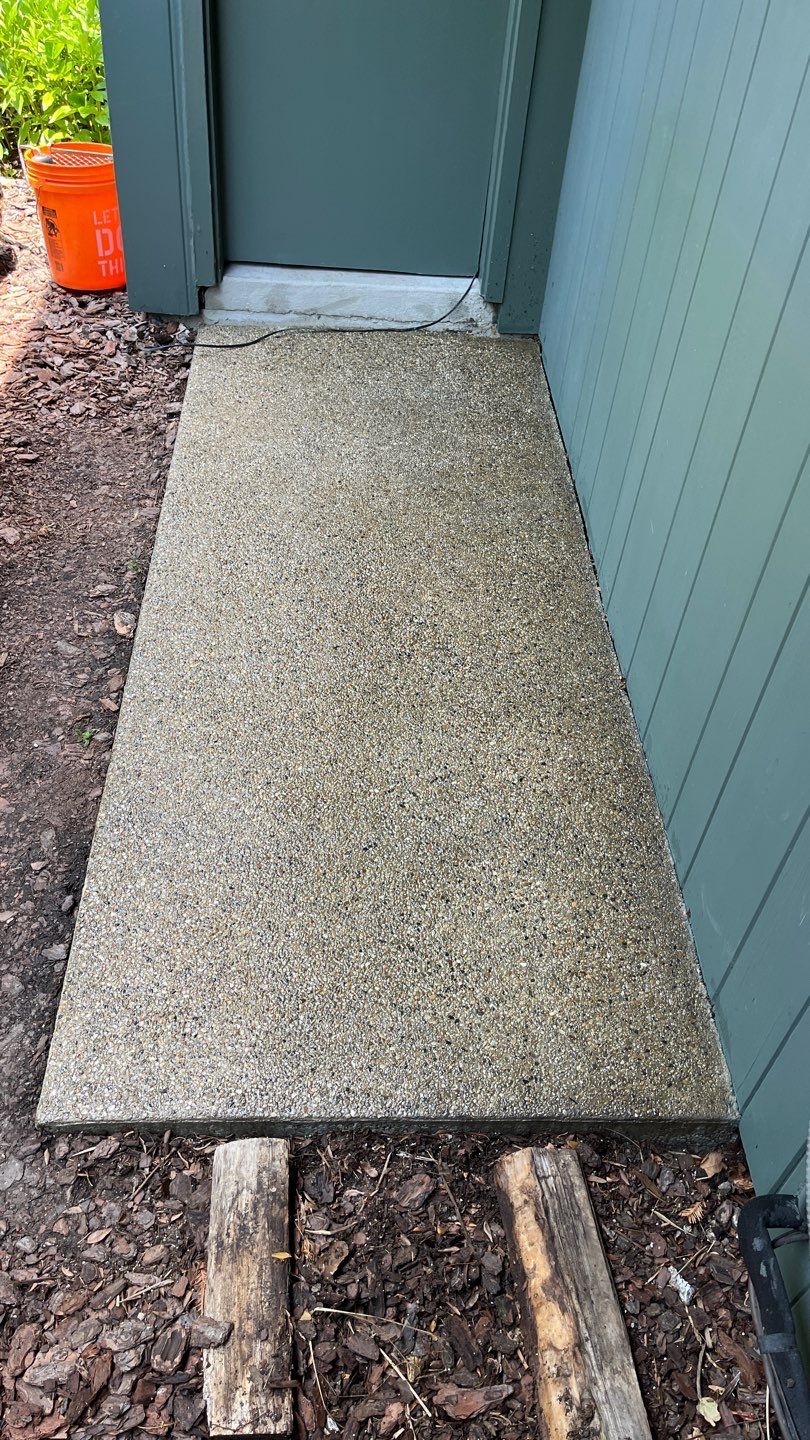 Aggregate concrete cleaning and sealing using Surebond SB-9000 by Northern Power Washing LLC.