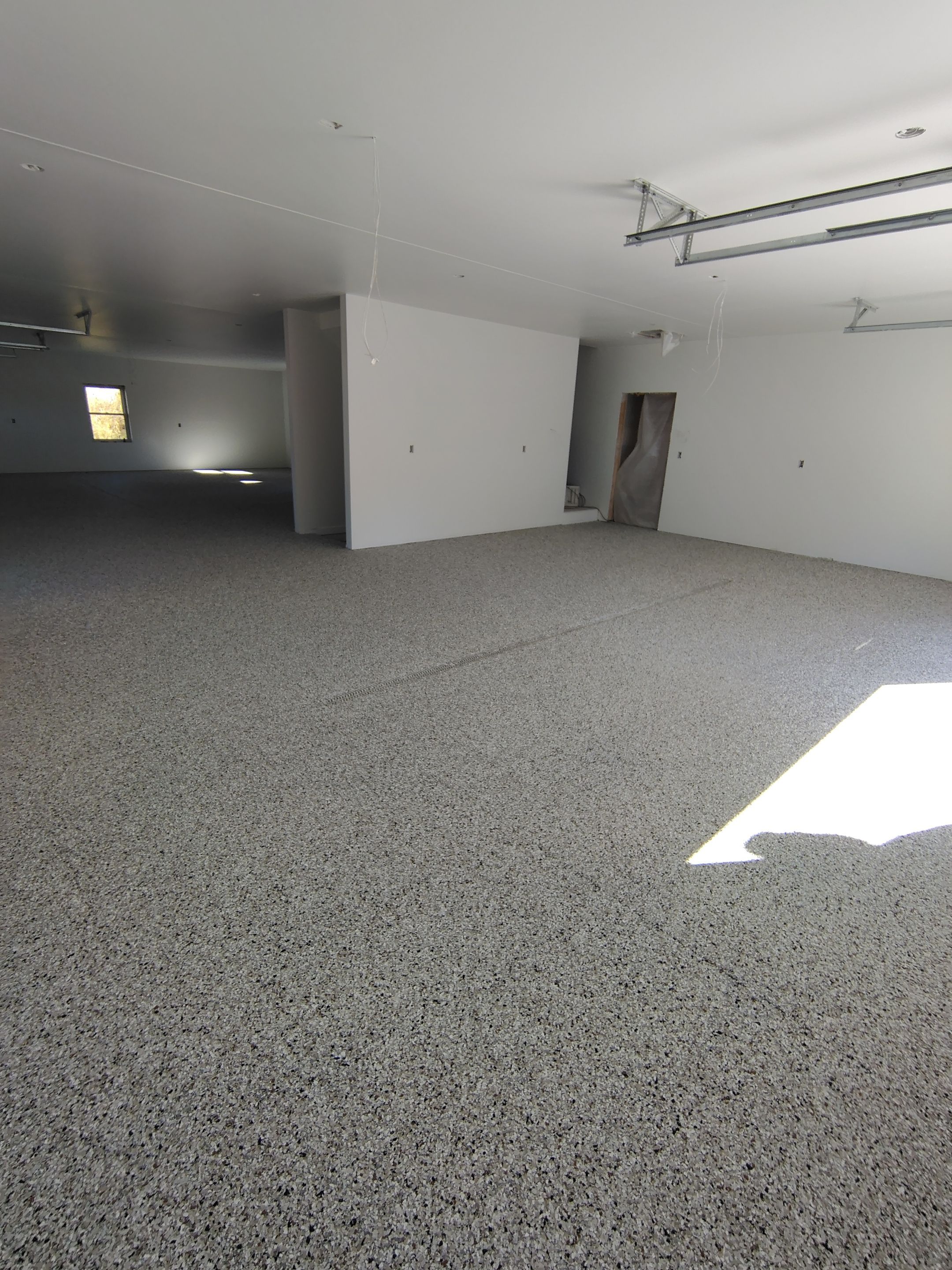Custom Garage and Basement Epoxy Floor Coating in Menno by Select Painting, Coatings & Garage Cabinets
