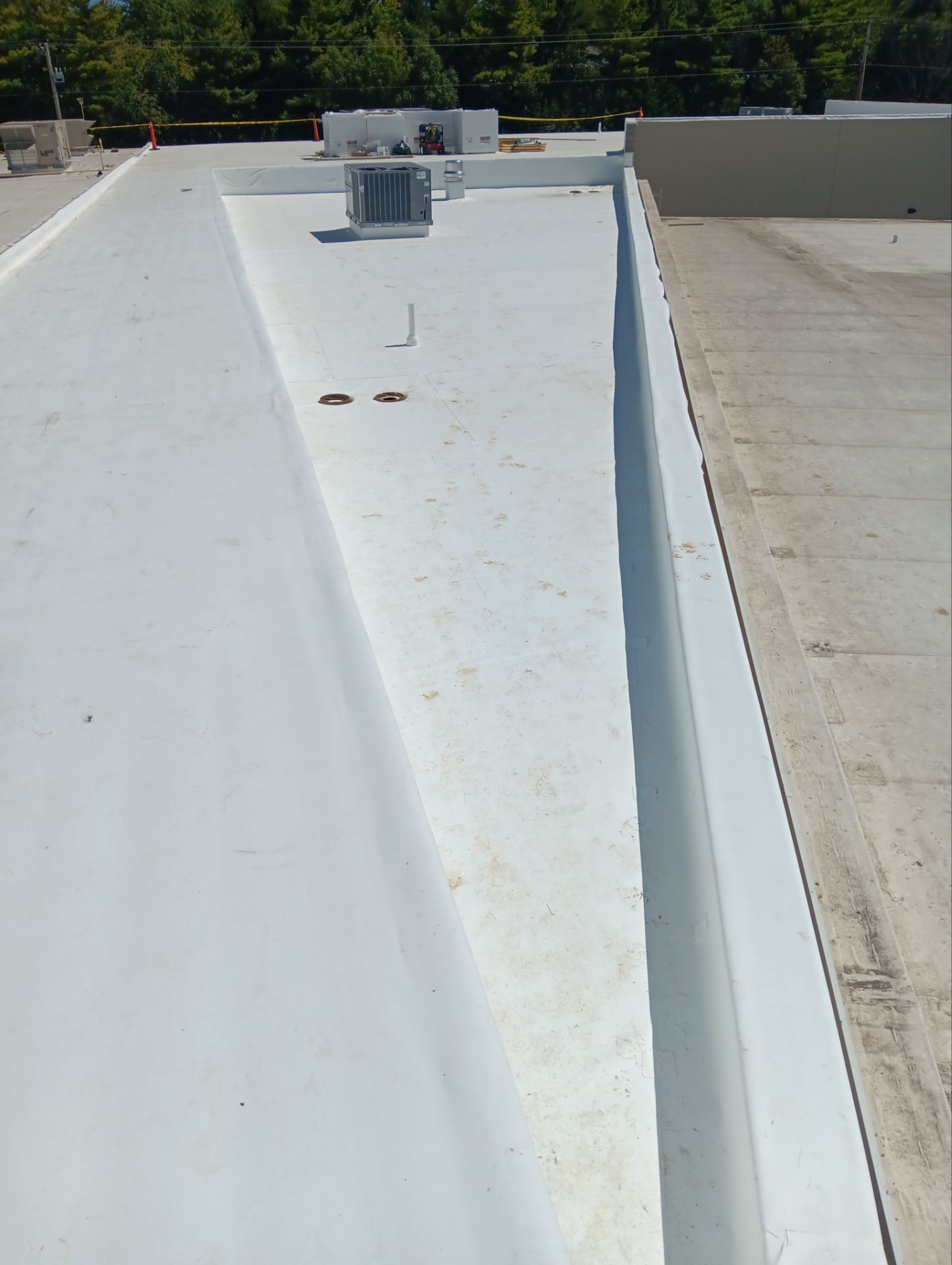 Commercial Roofing Installation using 60 mil GAF TPO by 3 Daughters Construction 