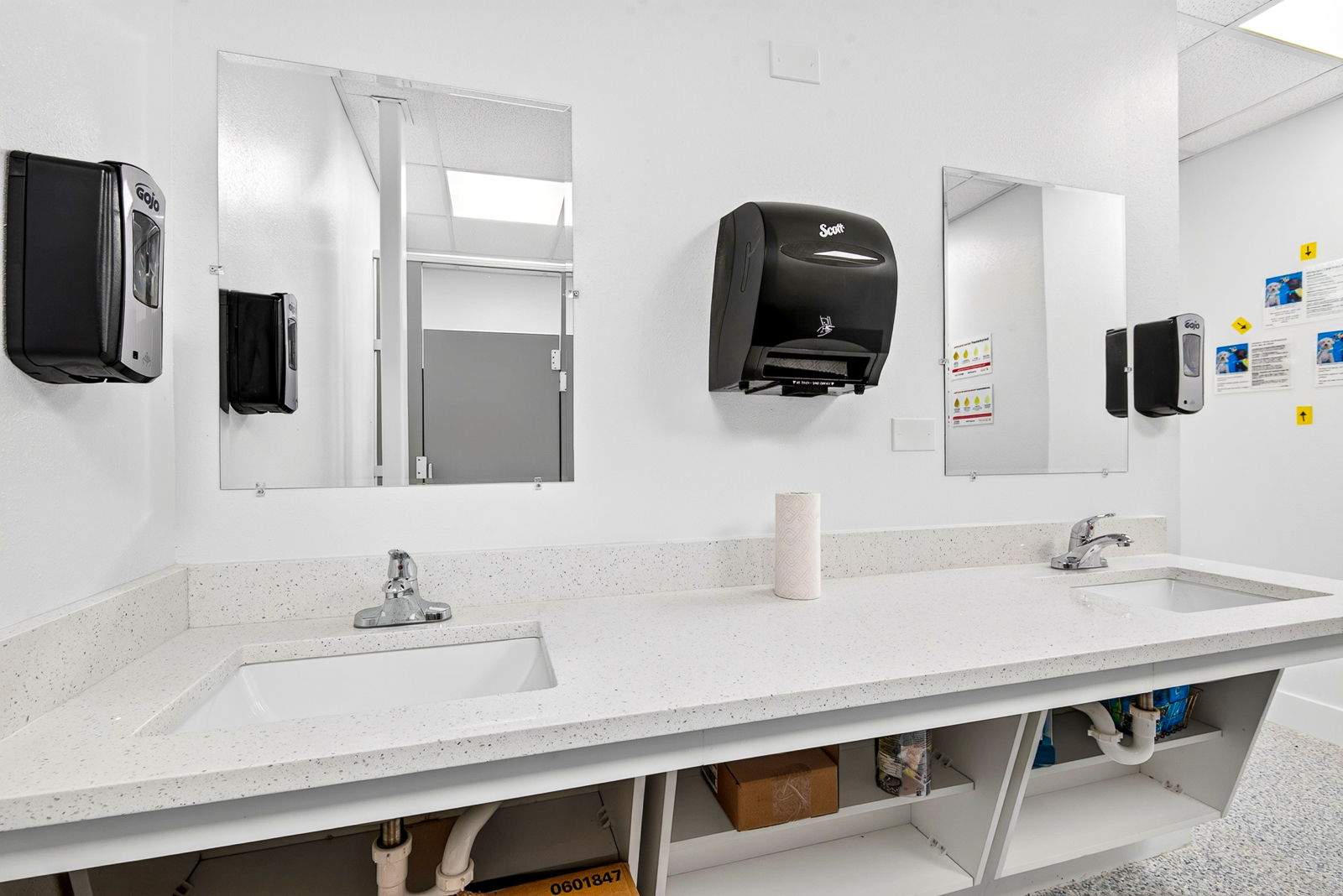 Commercial Restroom Renovation with Epoxy Flooring in Sarasota by Vertical General Contracting 