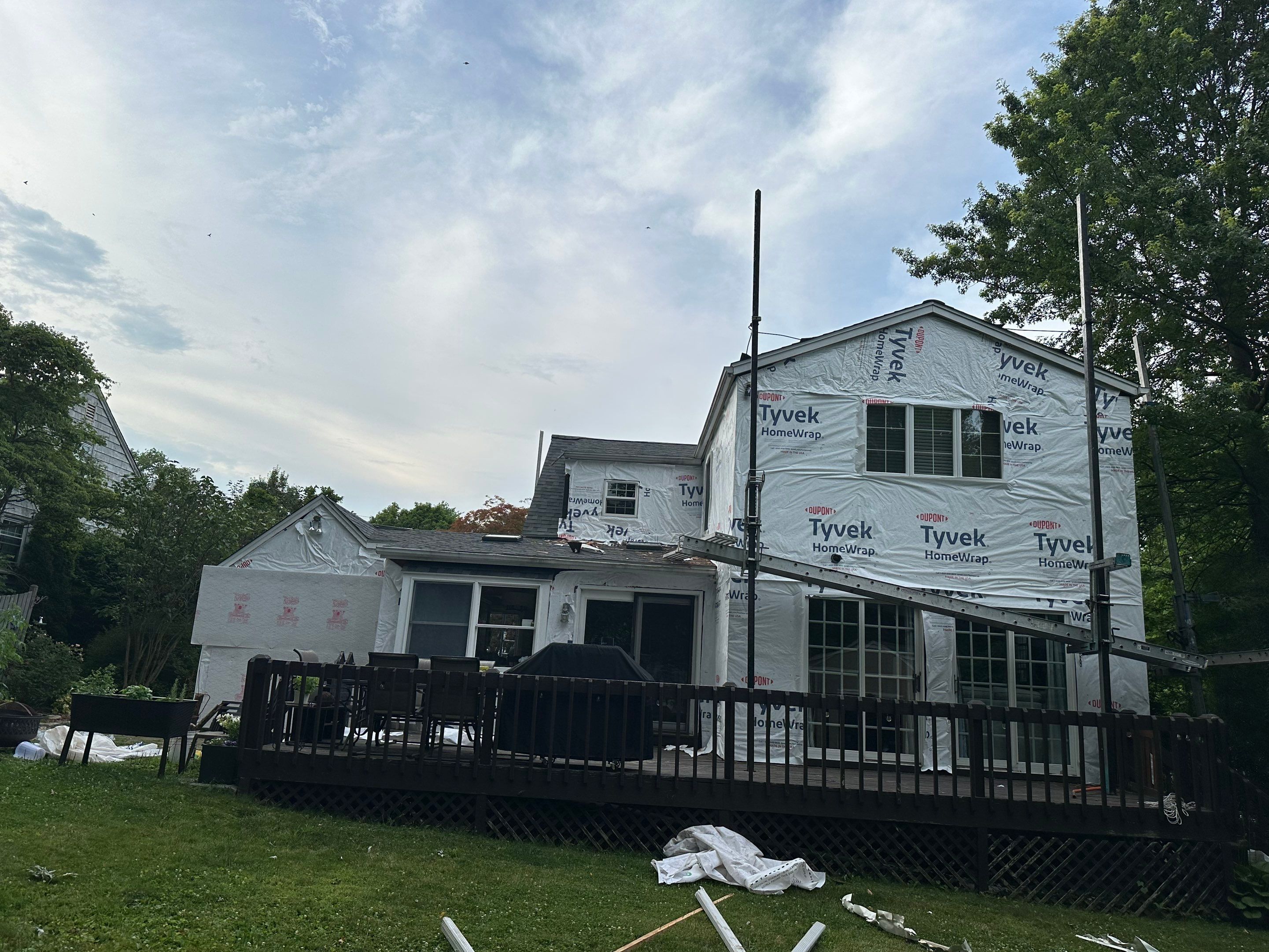 Complete Exterior Estate gray with Pacific Blue Siding by A Plus Exterior