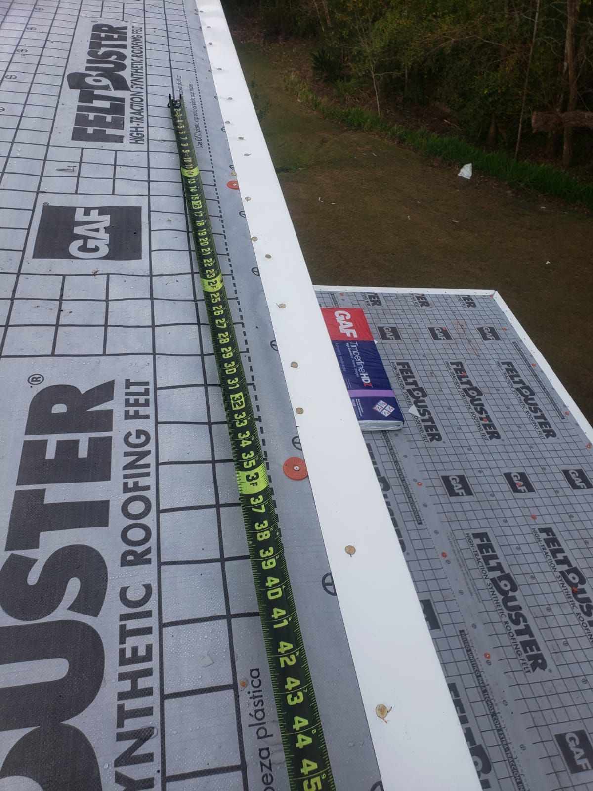 Residential Roofing Installation using Roof Replacement by American Roofing & Construction LLC