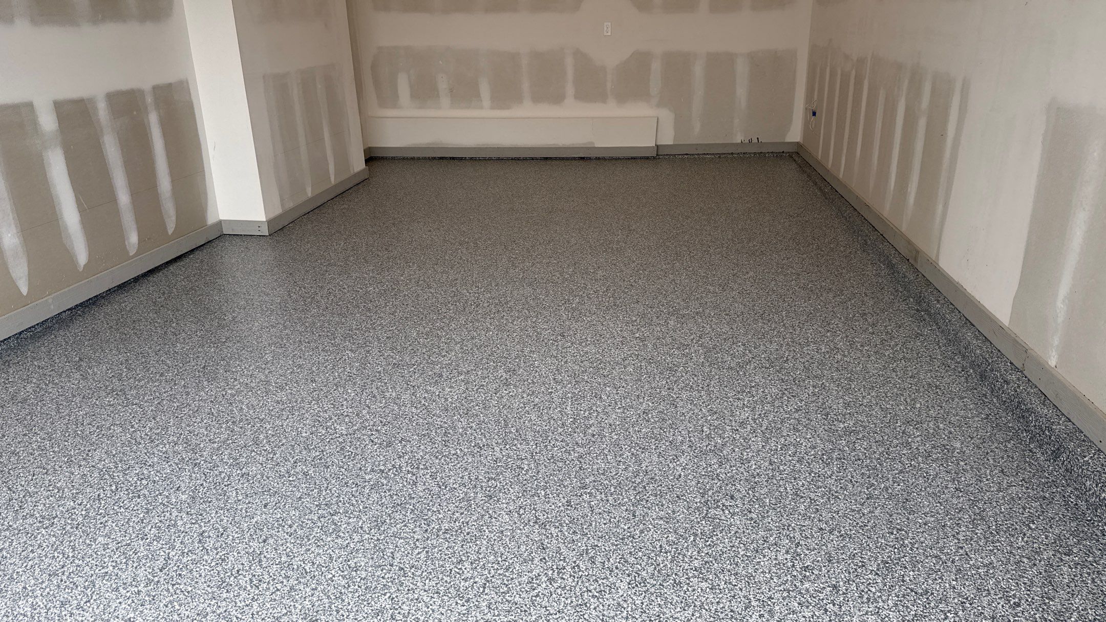 Make The Smart Choice and Get Your Floor Done Before Moving In  by Banner Garage