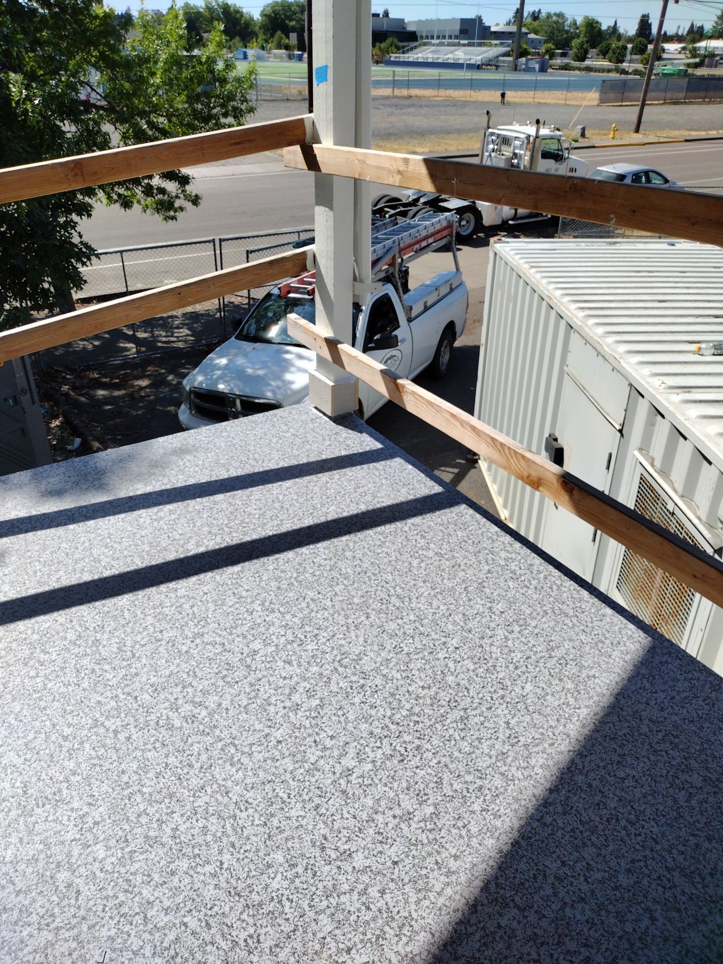 Dec-Tec Walkable Membrane using Dec-Tec (Color: Granite) by Orezona Building & Roofing Company, Inc.