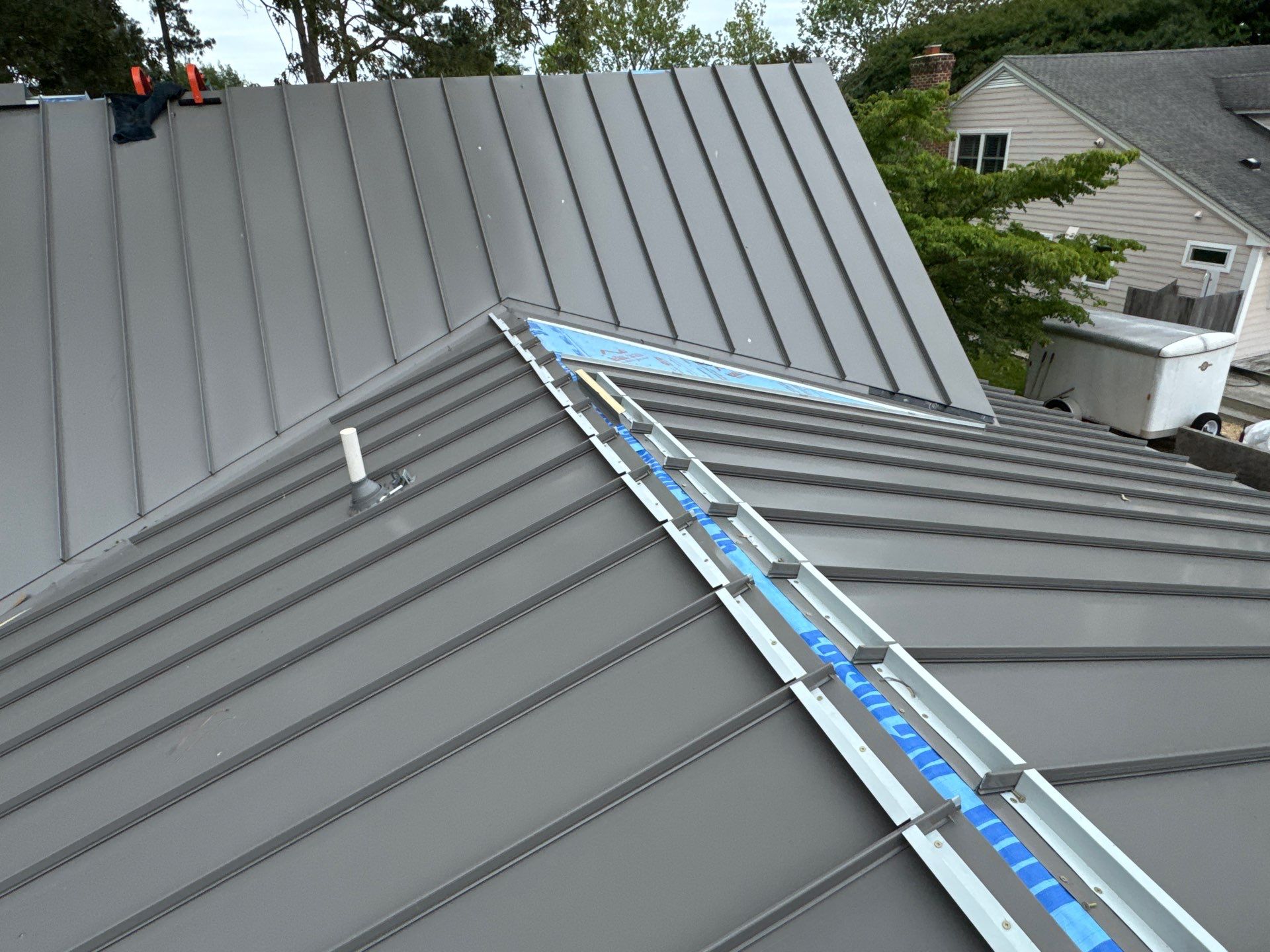 Custom New Construction Metal Roof Installation in Deltaville by Cade Construction