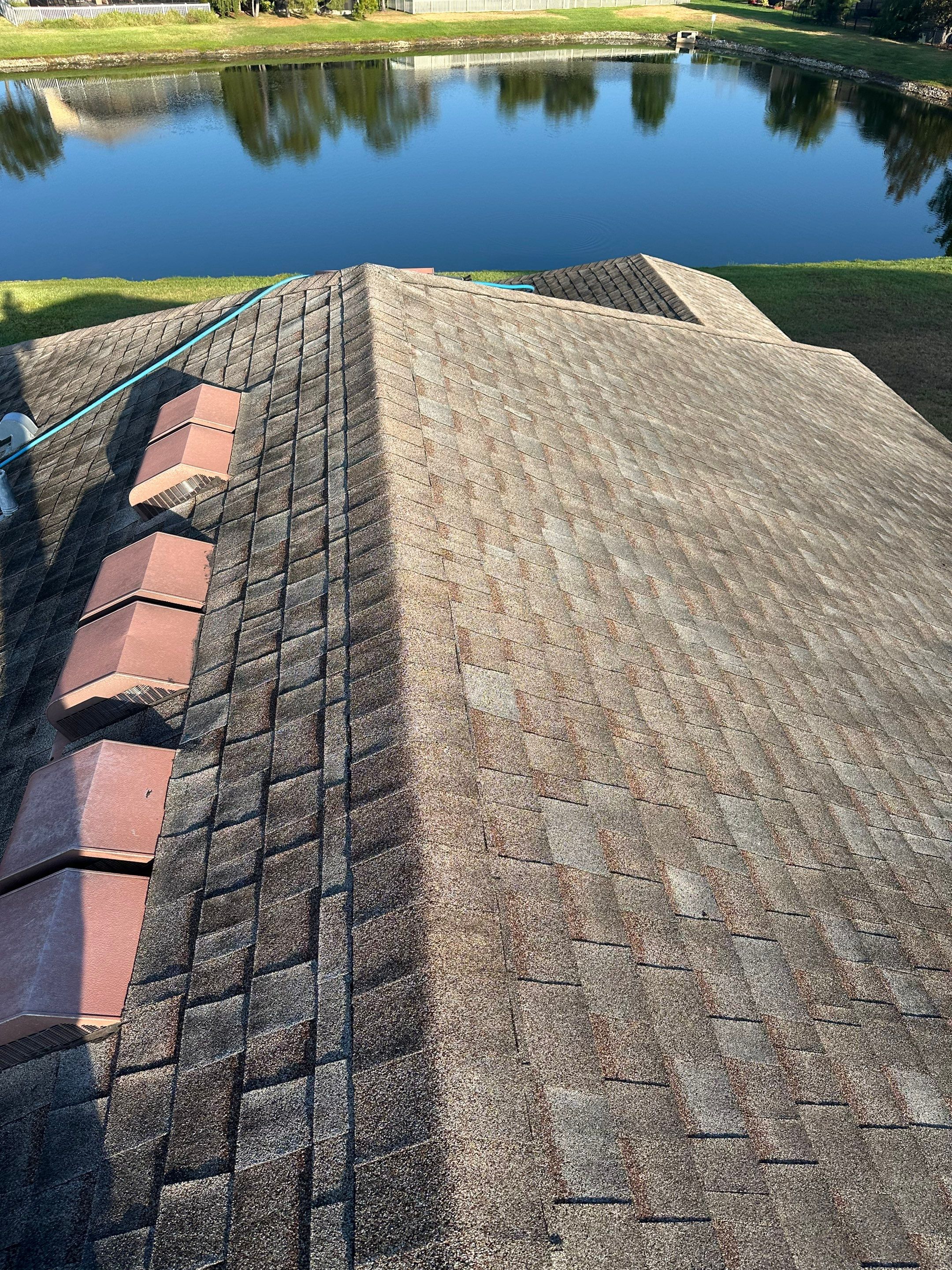 Asphalt Shingle Roof Soft Wash Cleaning & Concrete Pressure Washing in CopperStone Community, Parrish, FL by Sunshine AquaWash