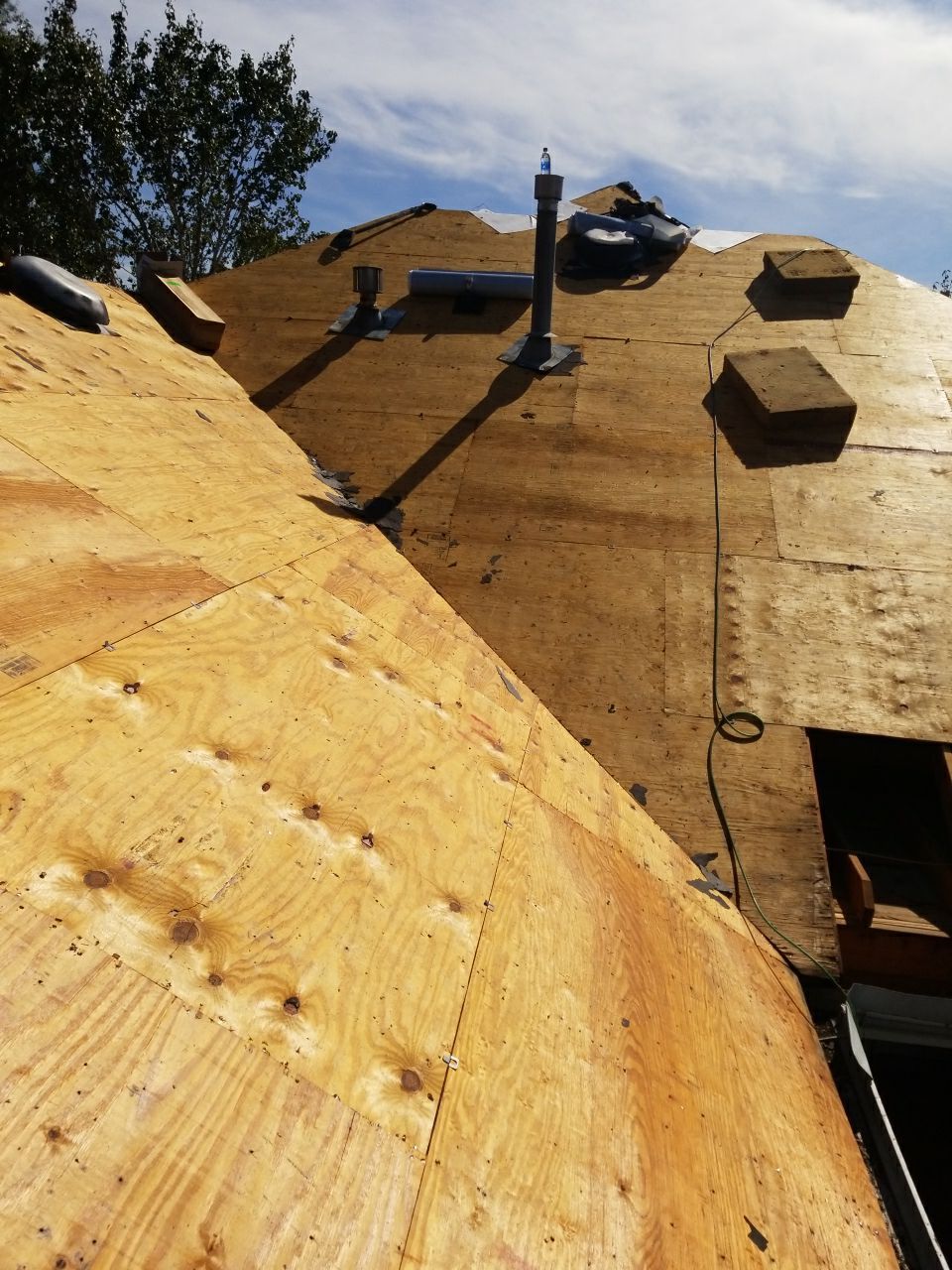 Residential Roofing Installation using Roof Replacement by American Roofing & Construction LLC