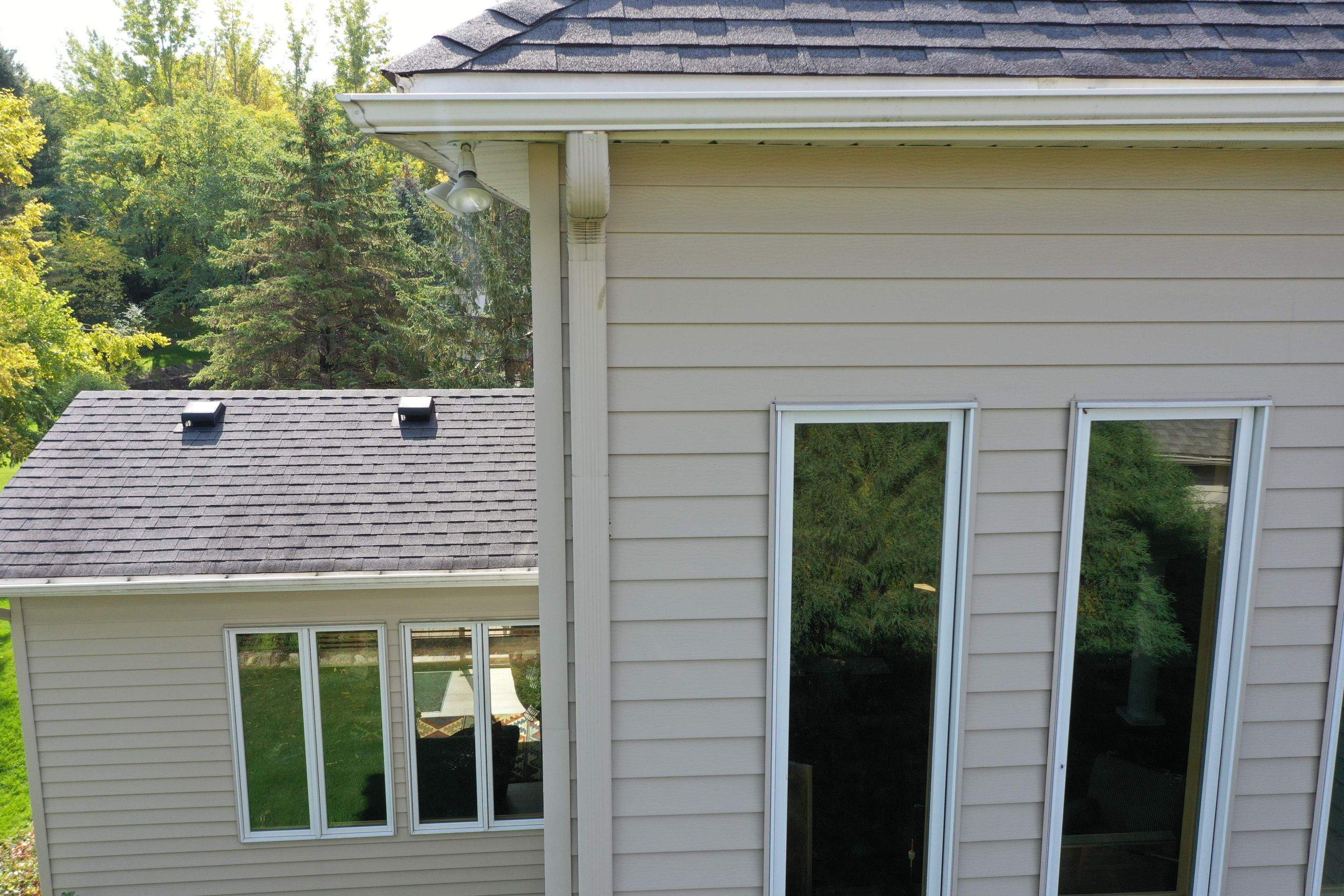 Residential Roofing Installation using Certainteed Landmark Moire Black by MODERN EXTERIOR SYSTEMS
