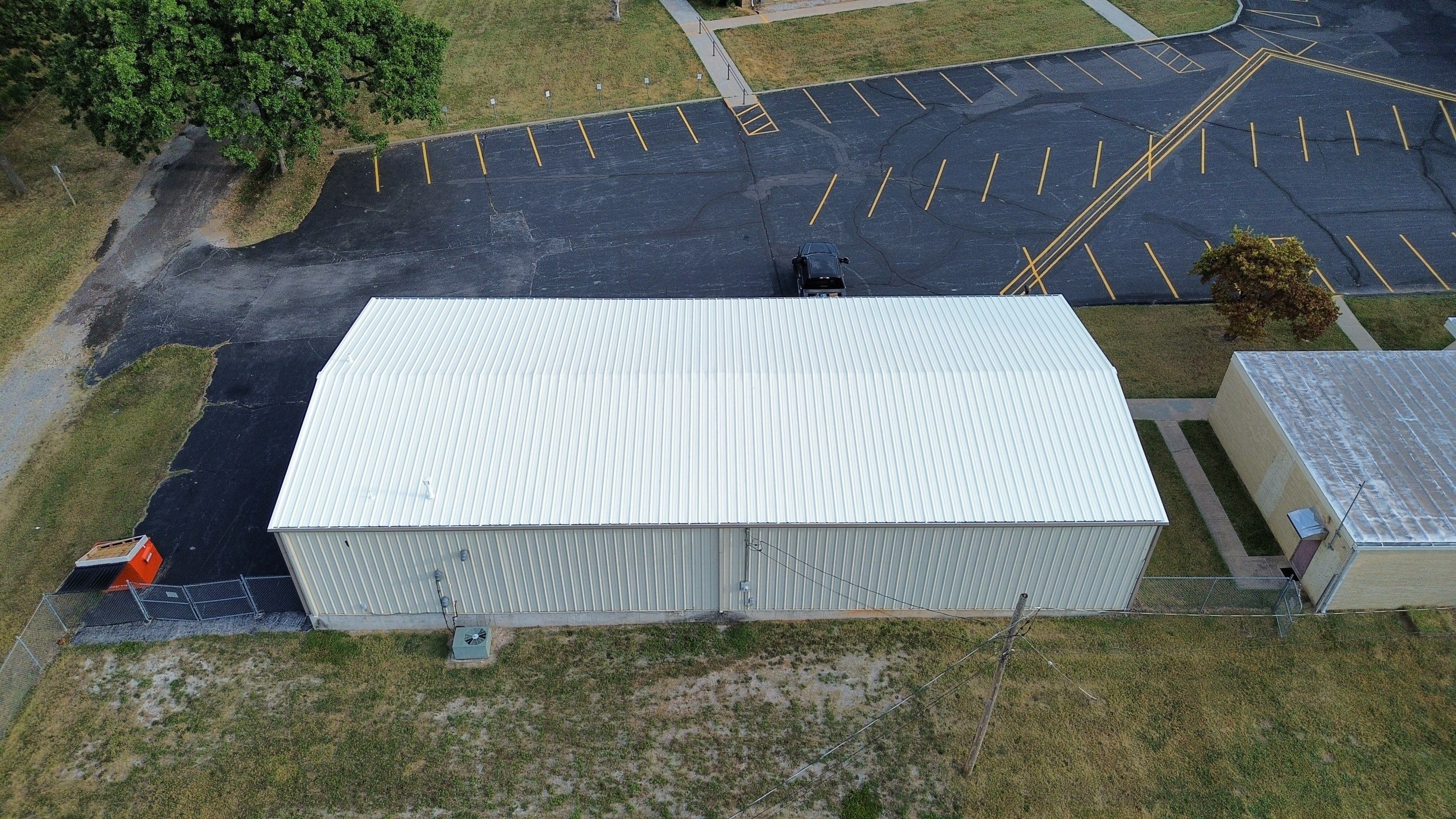 Commercial Roofing Install - Metal Coatings Restoration System  - Color White  by Titan Commercial & Residential Roofing 