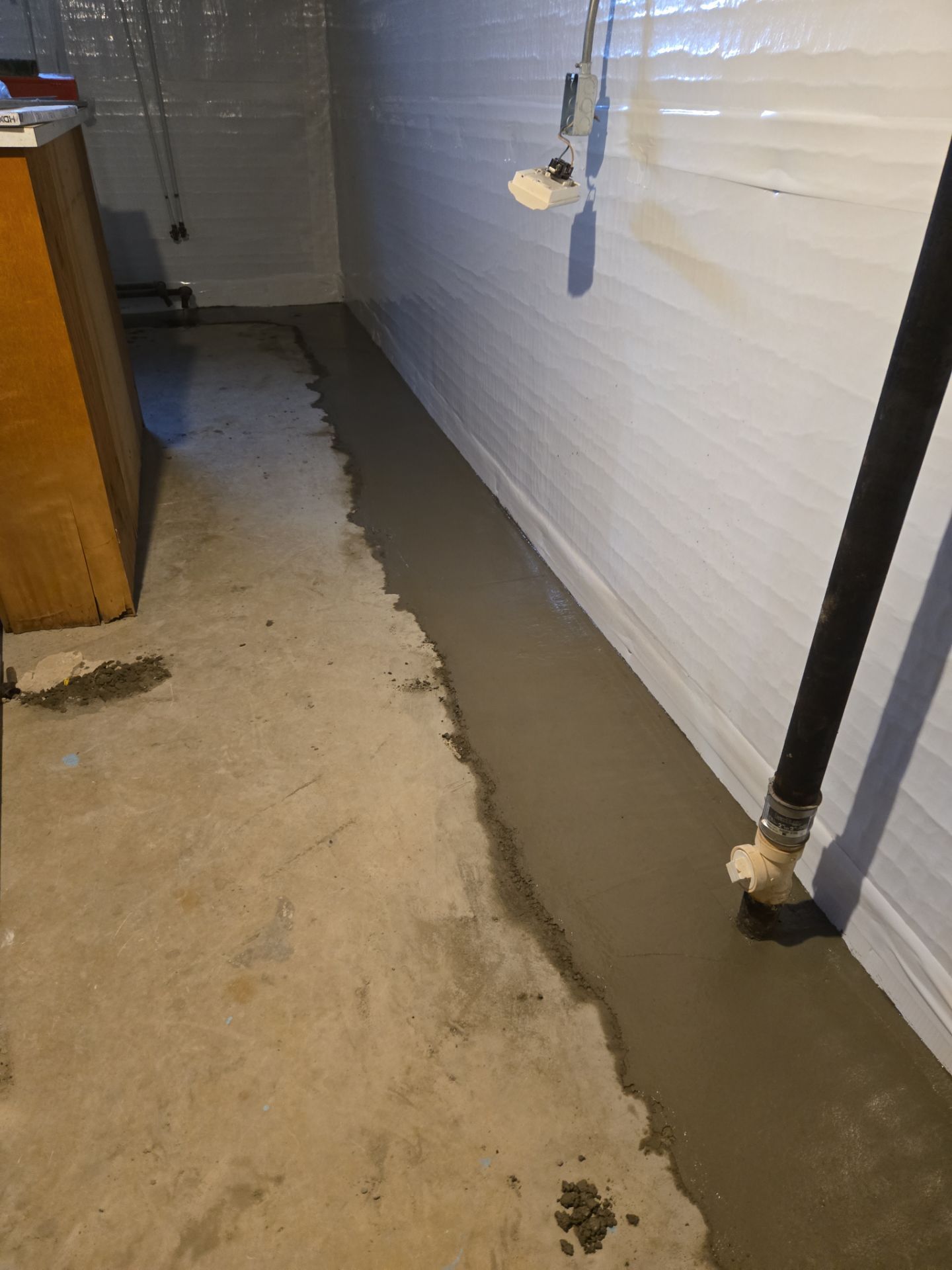 Interior Basement Waterproofing System with Embedded Fiber Reinforcement by Toledo Basement Repair 