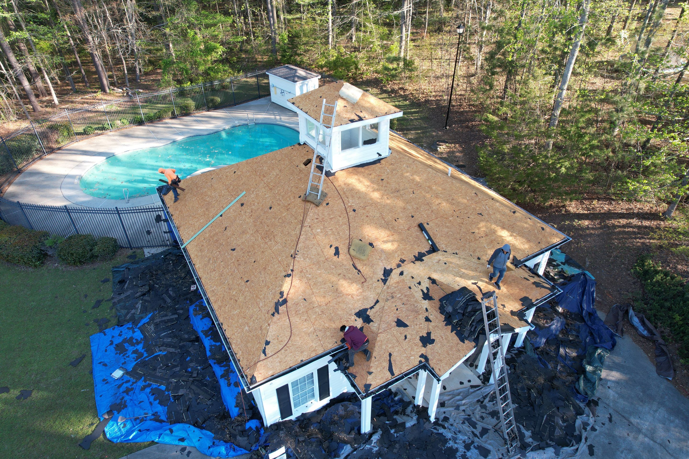 Pool House Roof Replacement using Owens Corning Onyx Black by Inspector Roofing and Restoration