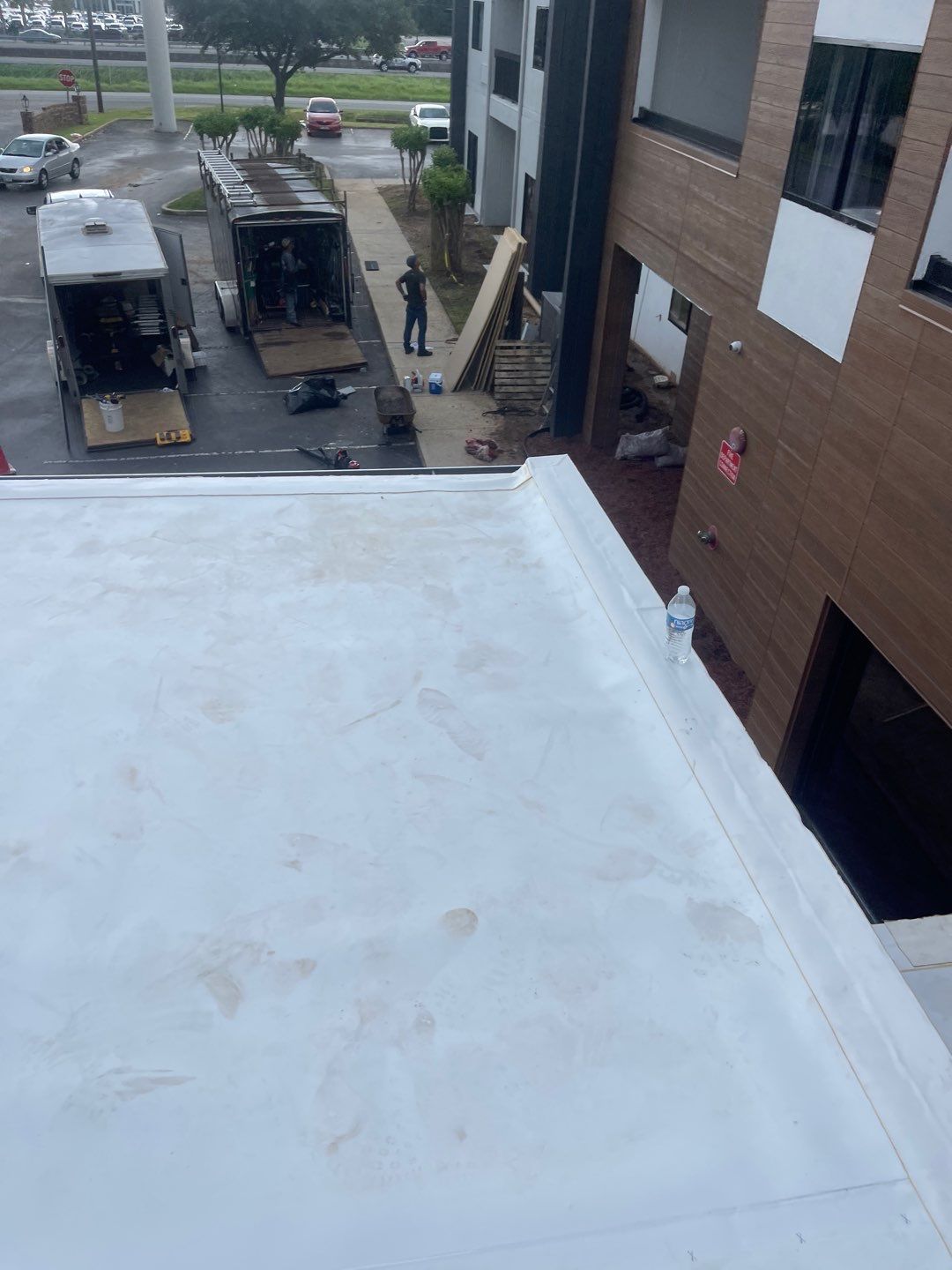Commercial Roofing Installation using Roof Replacement by American Roofing & Construction LLC