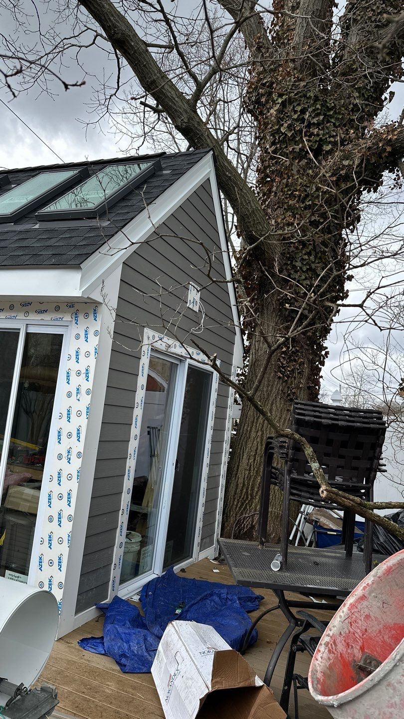 Siding Installation using Hardie Plank Aged Pewter by A Plus Exterior