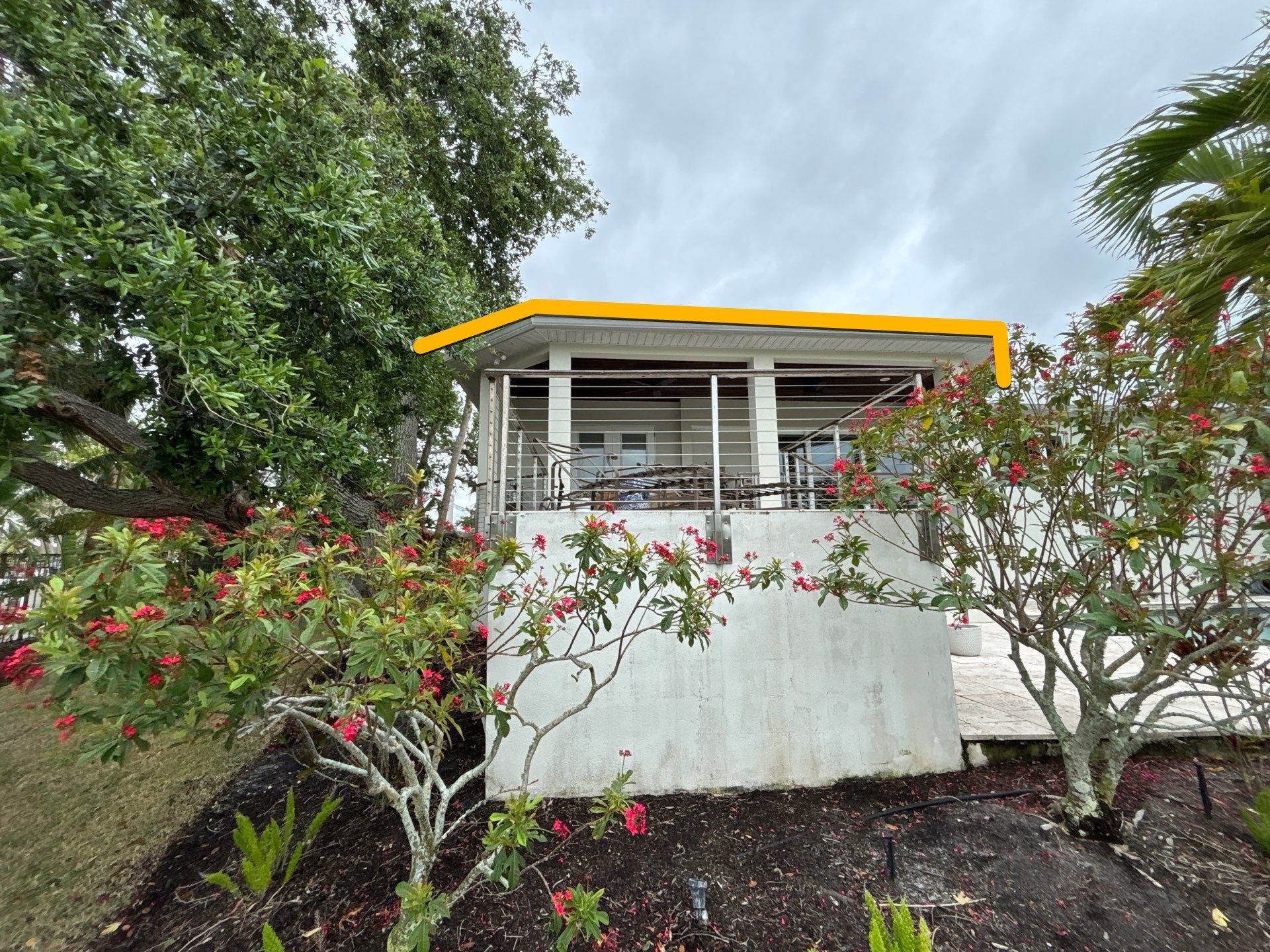 6-Inch White Seamless Gutters Installation in Siesta Key FL by Gutter Professors