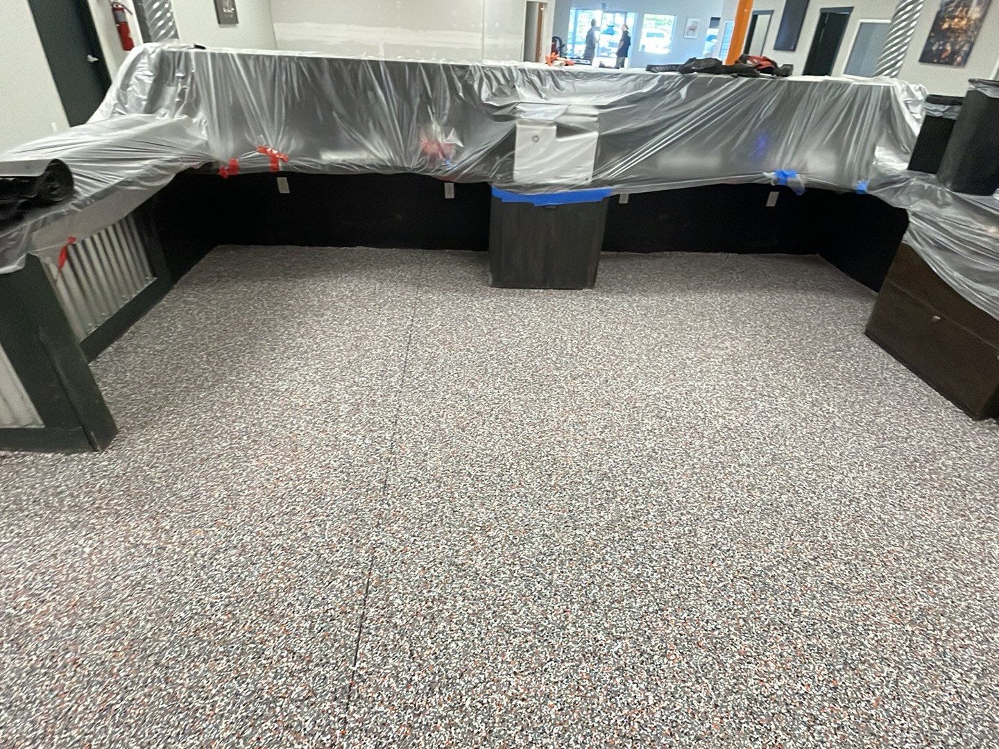Equipment Share Commercial Floor Transformation using Smoke w/ 5% Orange by Croc Coatings, LLC