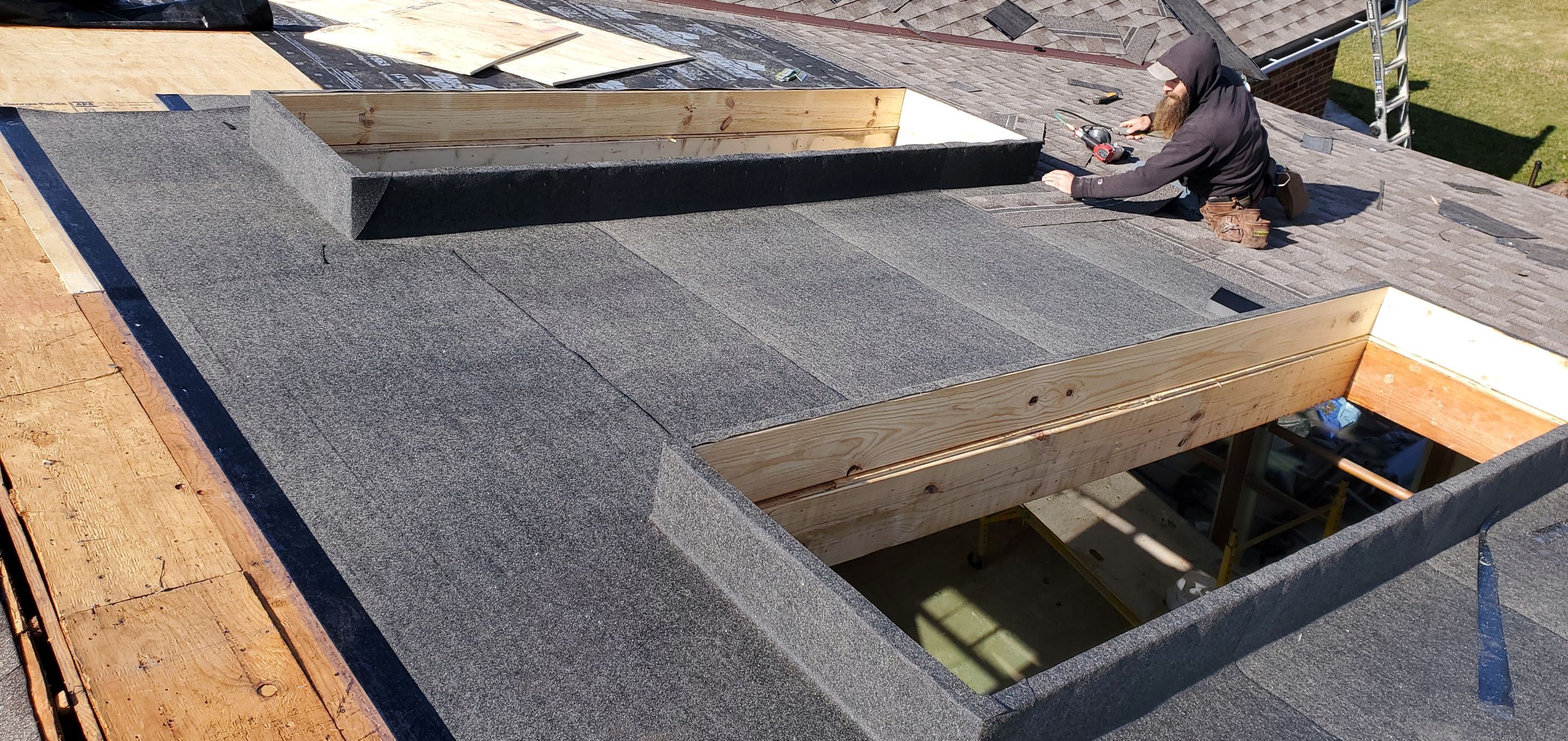 Skylight removal and install  by Absolute Roofing and Construction