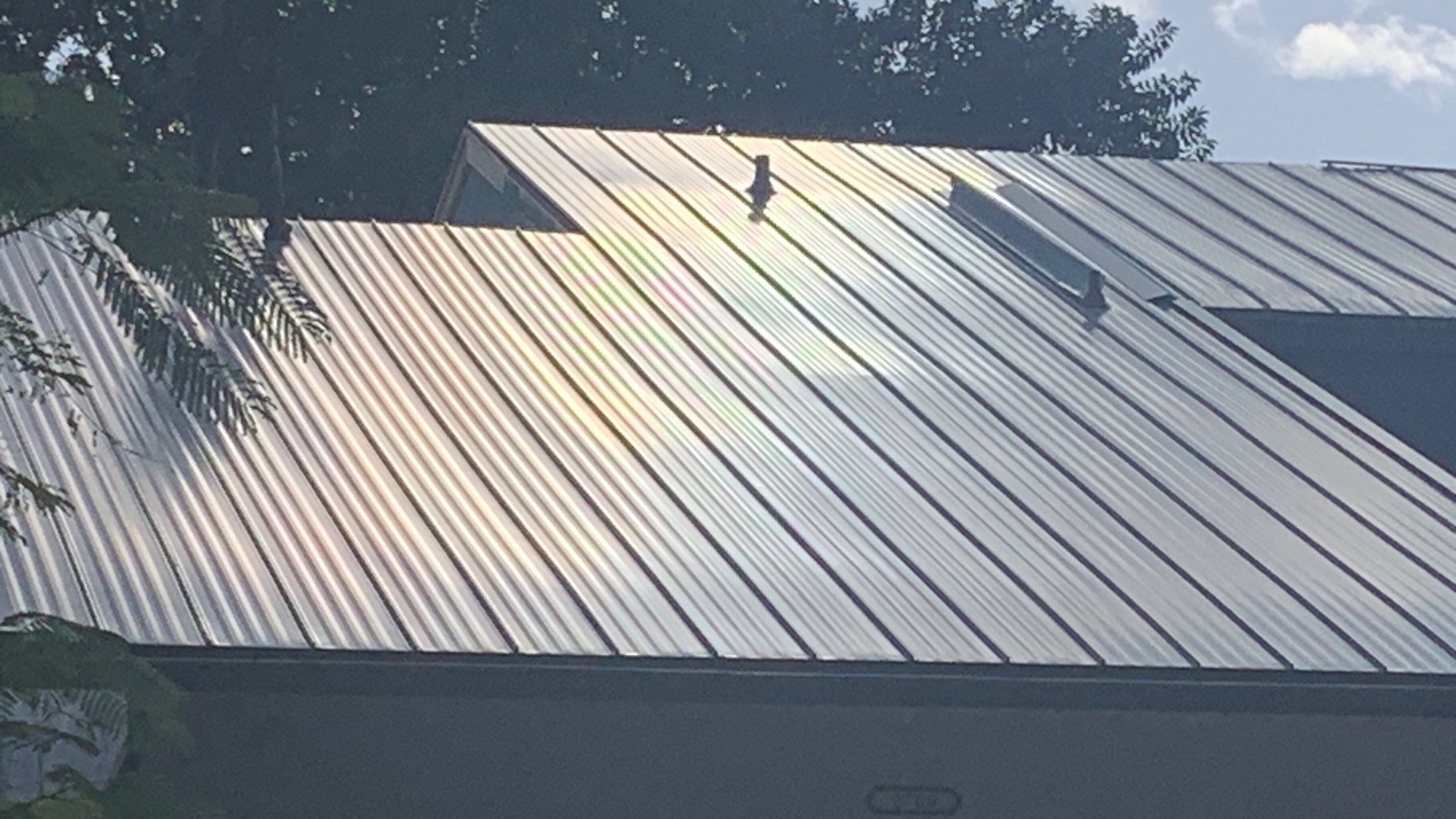 Residential Roofing Installation using 1" Nail strip metal roof by BLUES BROTHERS ROOFING