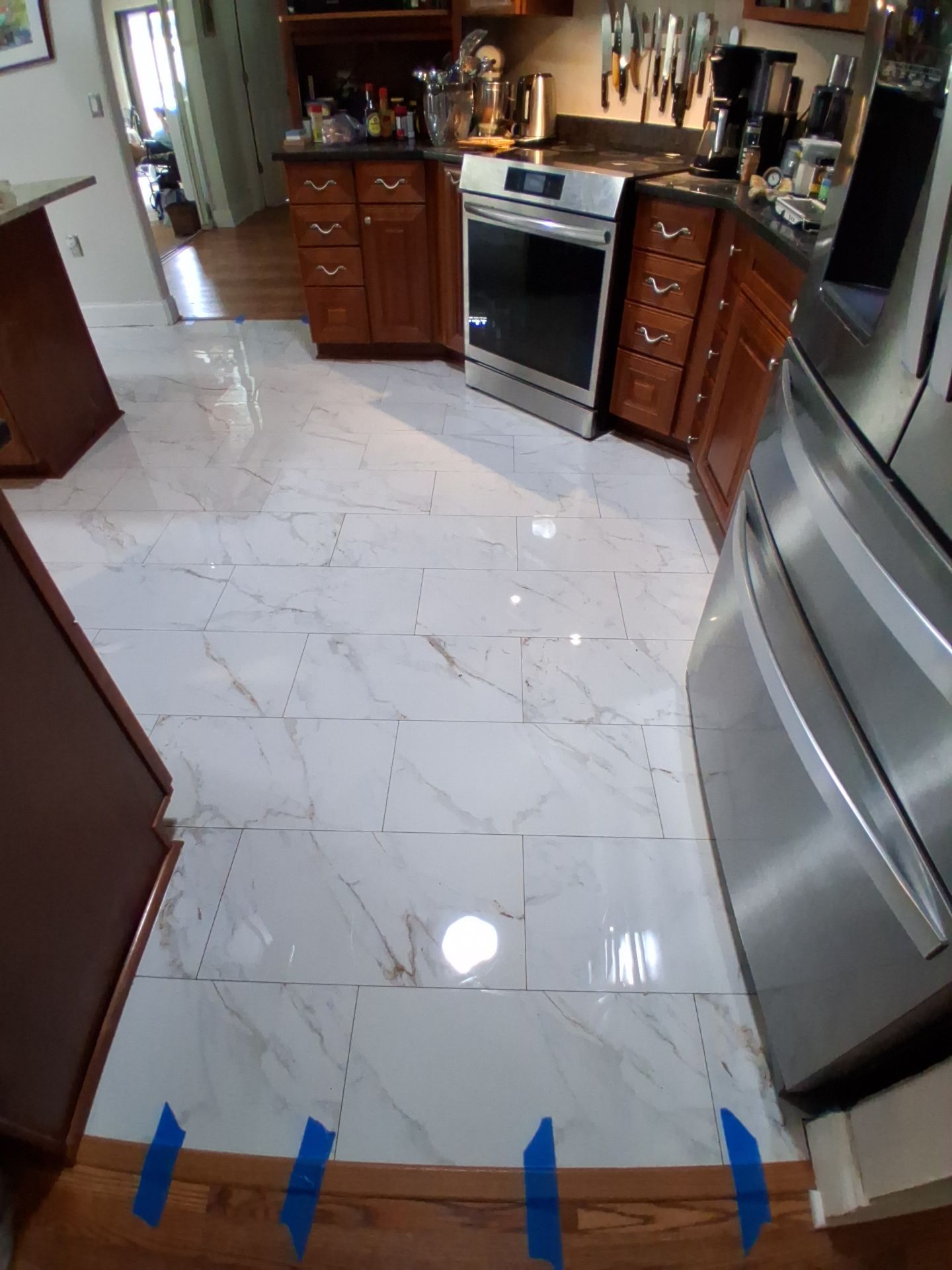 Kitchen Tile Upgrade  by Vrmmm Flooring