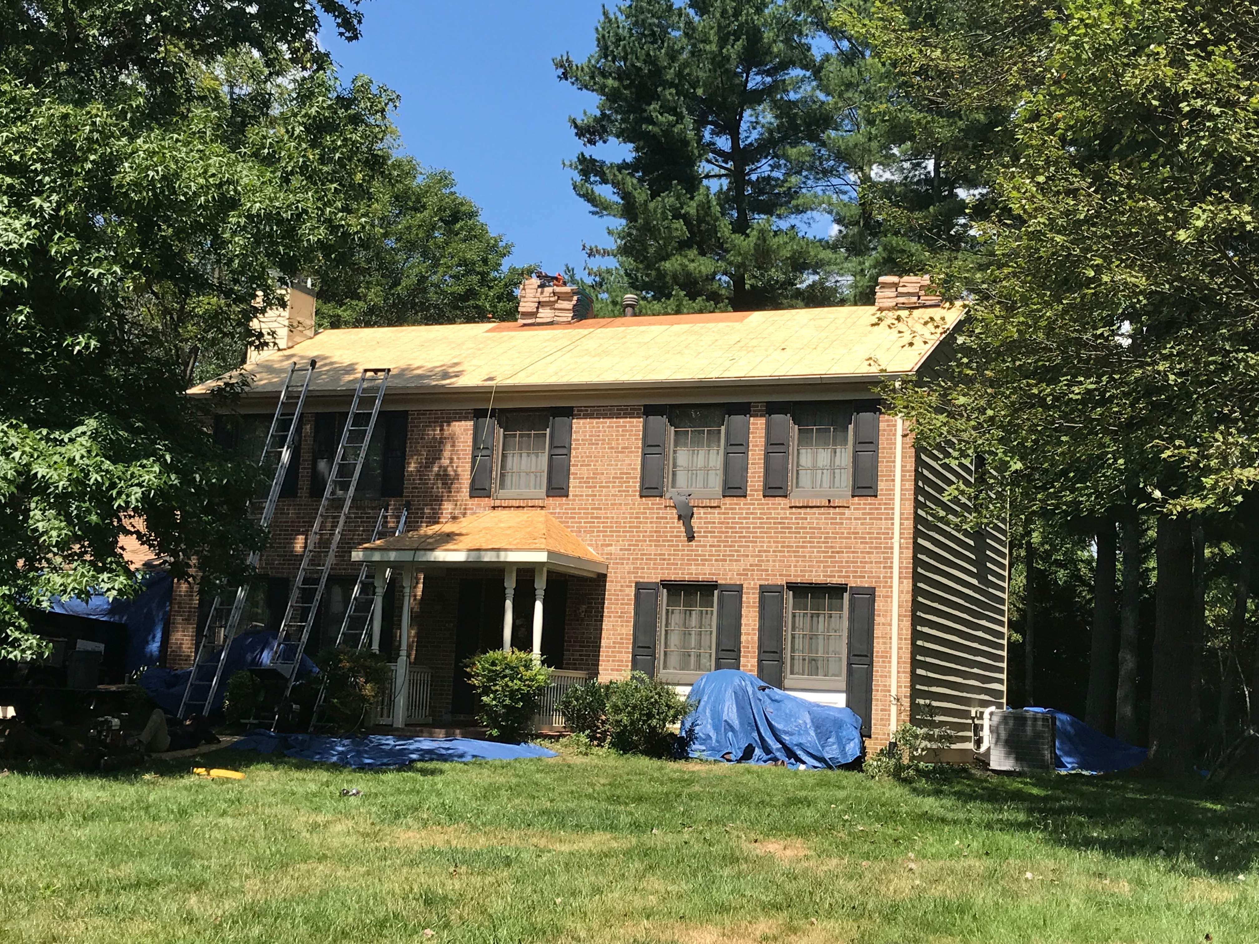 Residential Roofing Installation using Landmark Shingles Color Weatherwood by Alpha Design Services