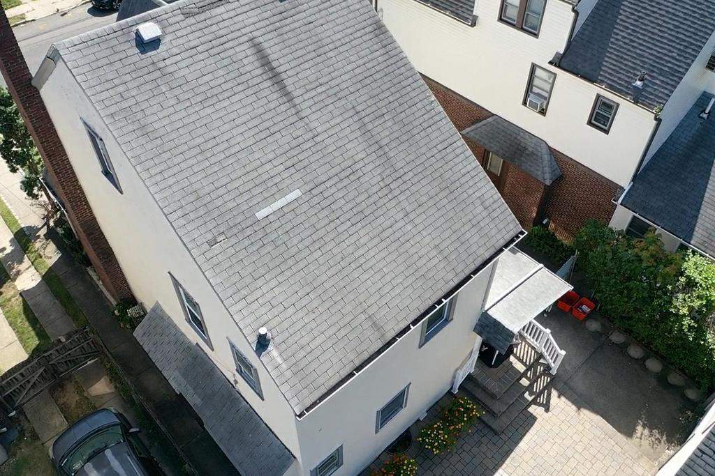 New Roof & Gutters by Island Roofing Inc.