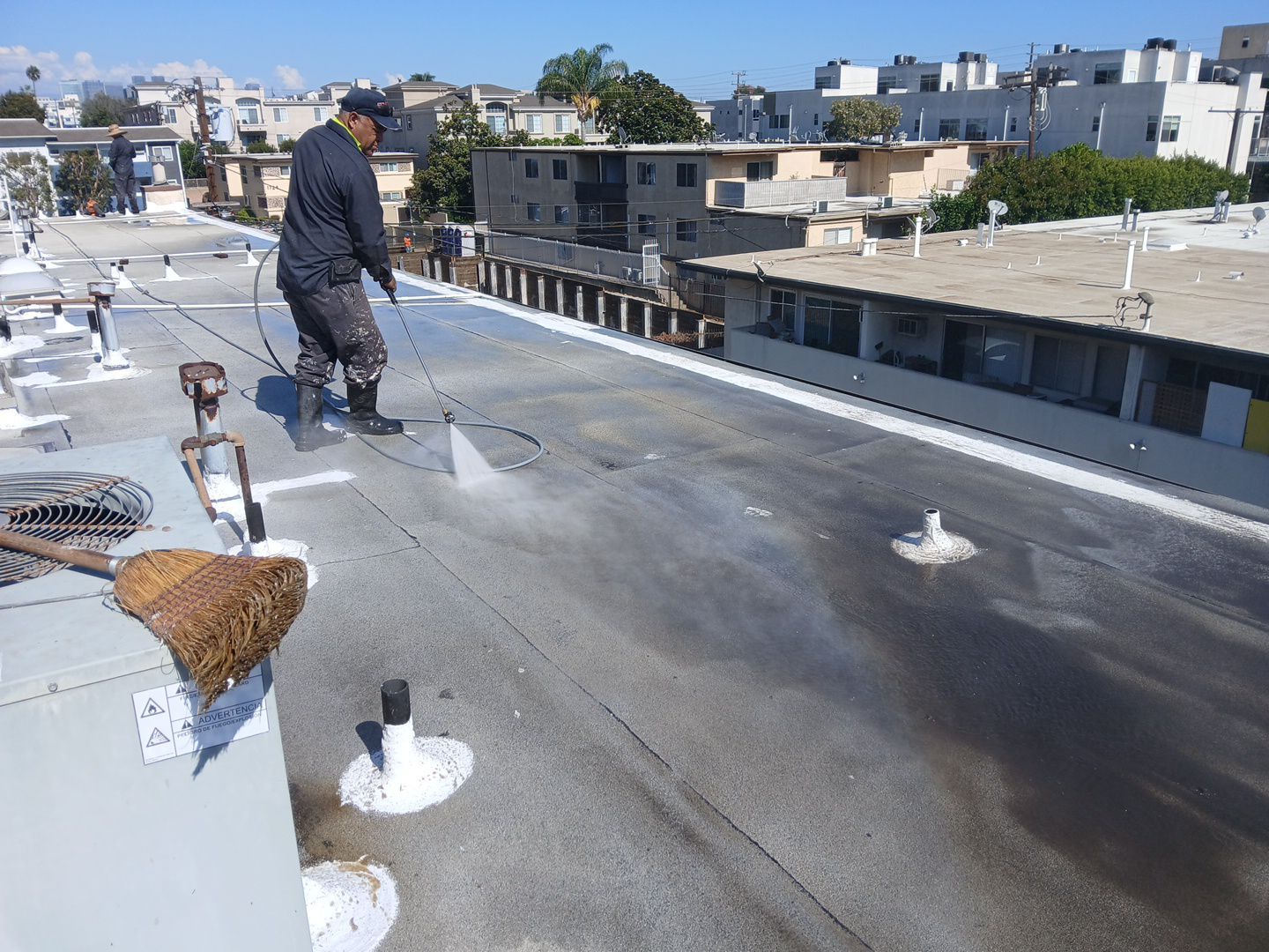 Apartment Building Silicone Coating by Hull Brothers Roofing