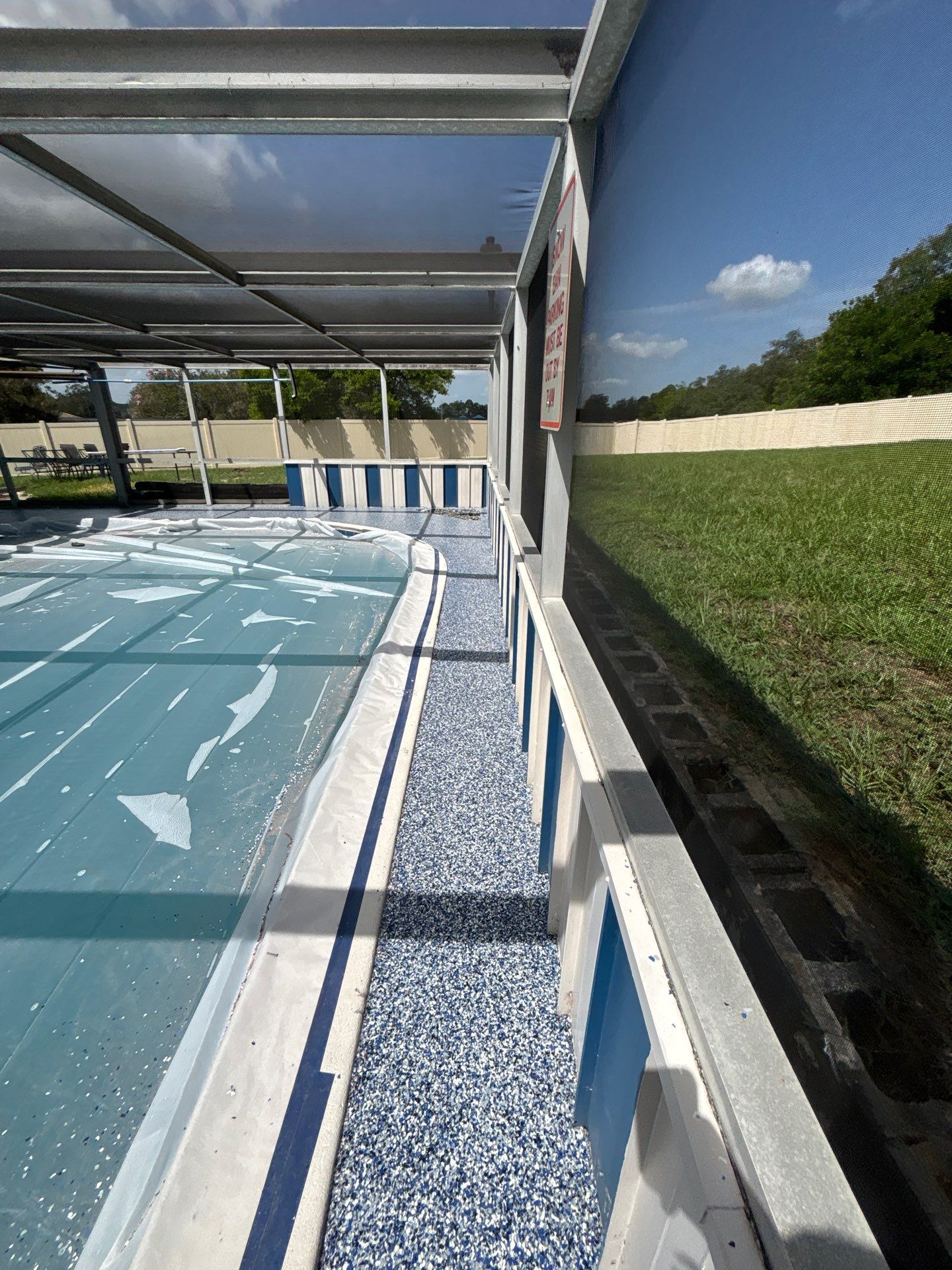 Lake Wales Pool Deck Concrete Coating with Orbit Flake by Performance Floors & Coating