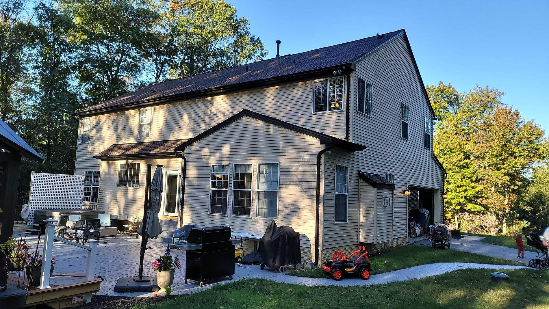 Gutter Installation using Black Gutters, soffit & fascia by Roof Right Inc