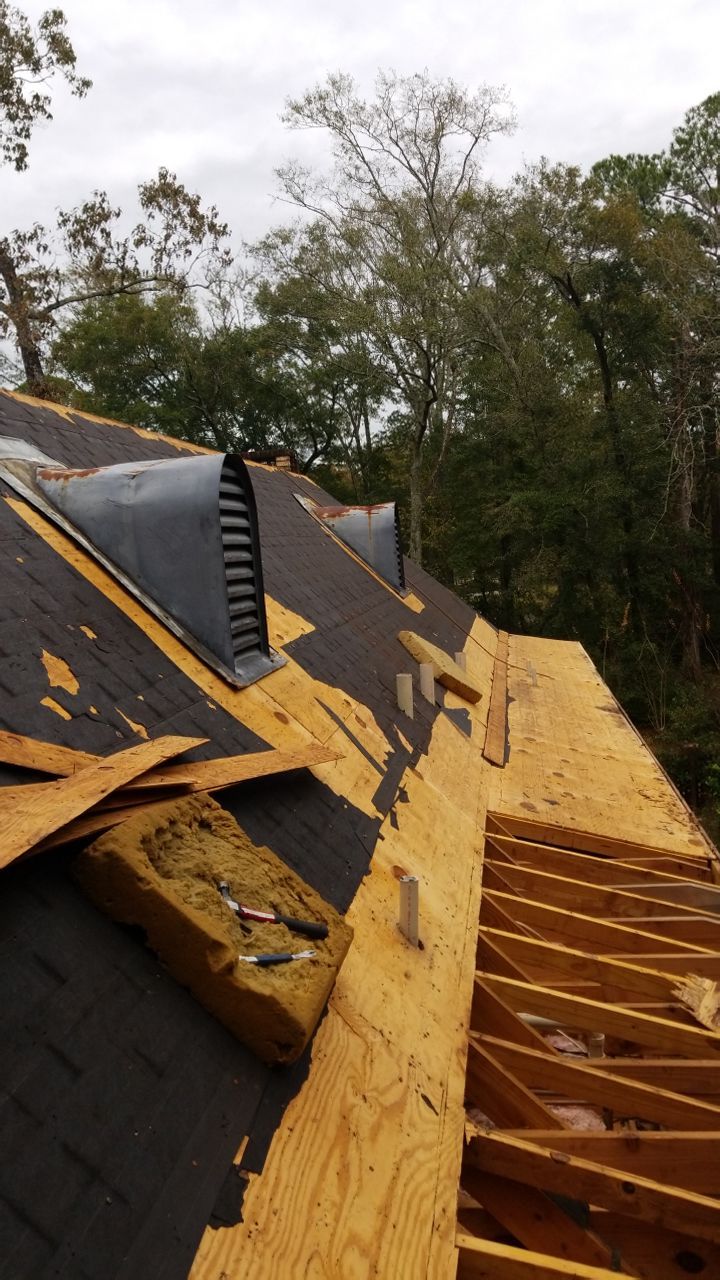 Residential Roofing Installation using Roof Replacement by American Roofing & Construction LLC