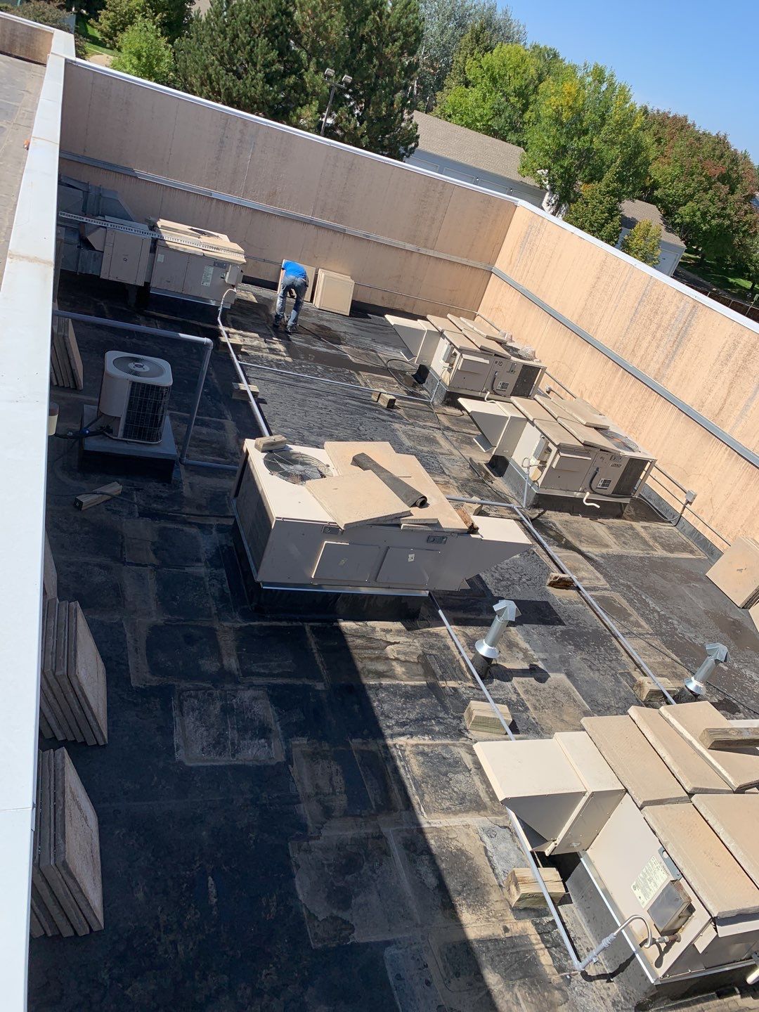 Commercial Roofing Installation using American Standard Coating - S  by A to Z Roofing