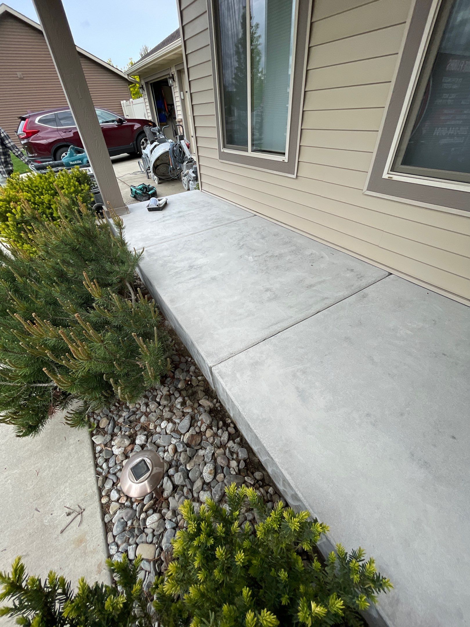 Garage Transformation using Pebble Beach and Front Porch using Greystone by Croc Coatings, LLC