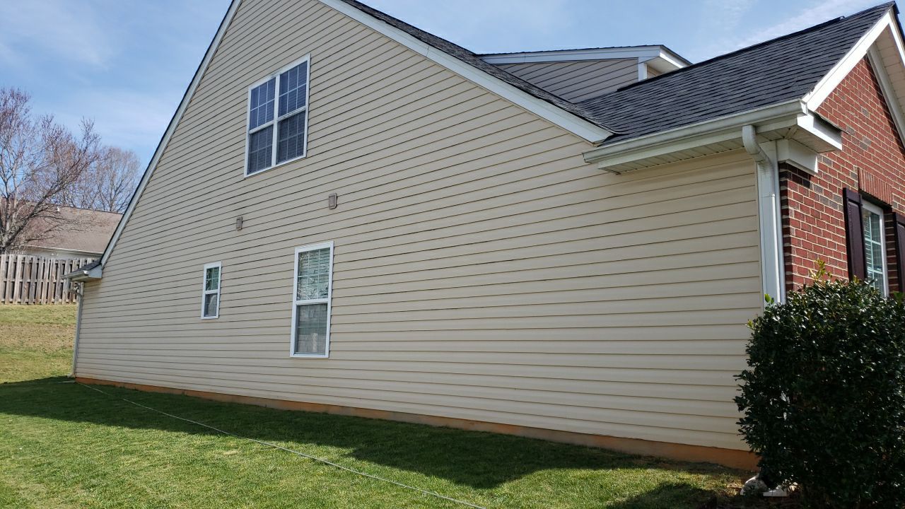 House Wash using cleaner by Power Wash Masters LLC