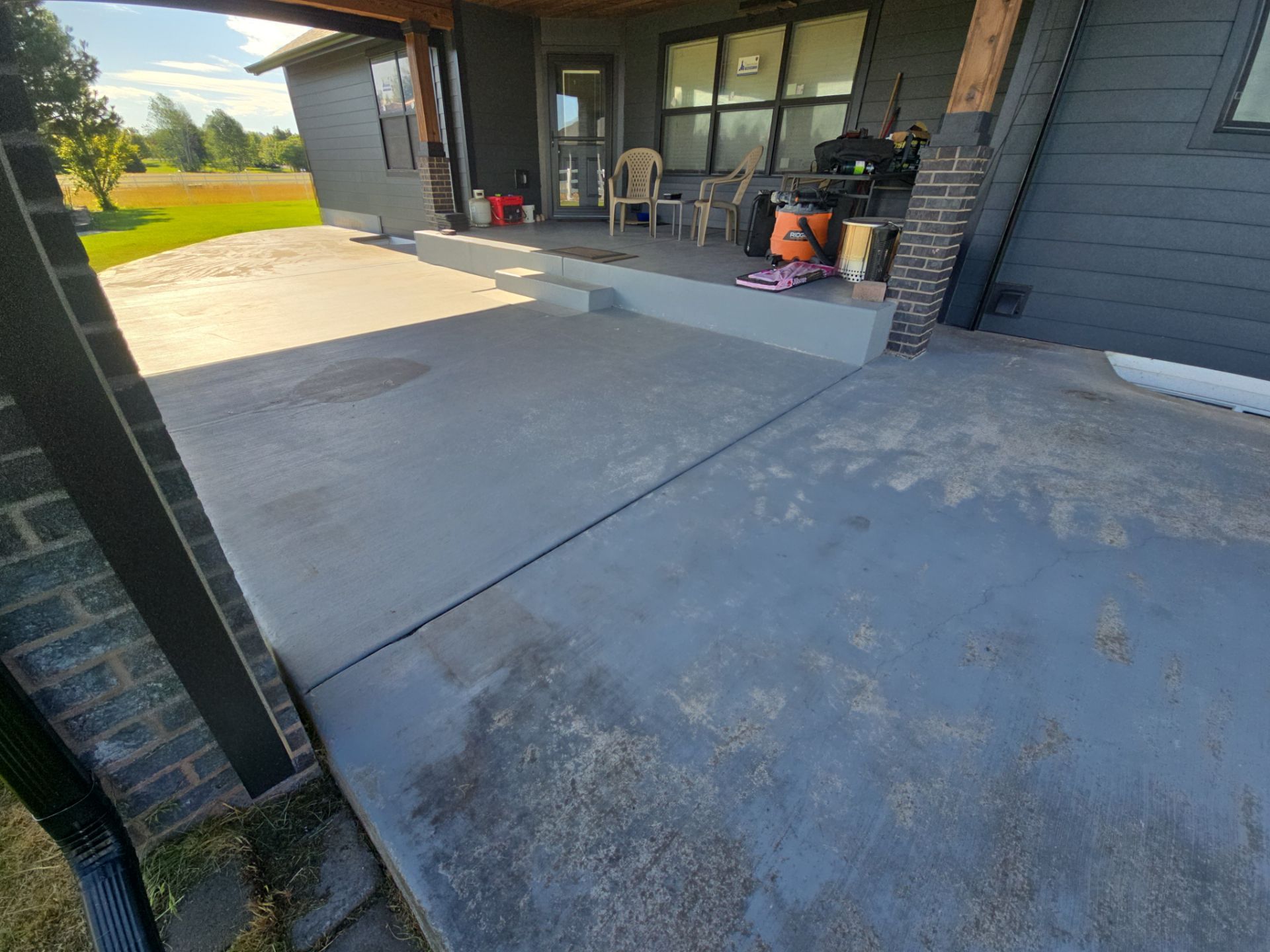 Slate Hybrid Concrete Patio and Apron Coating in Post Falls by Croc Coatings, LLC