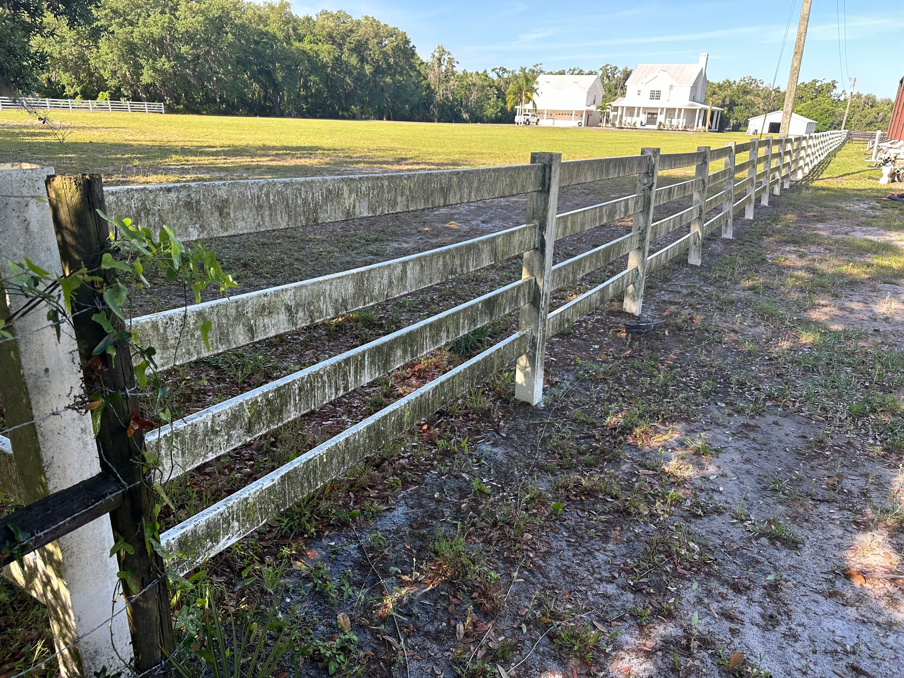 Vinyl Horse Fence & Concrete Pier Cleaning at Lesley Cox Equestrian, Parrish, FL | Sunshine AquaWash by Sunshine AquaWash