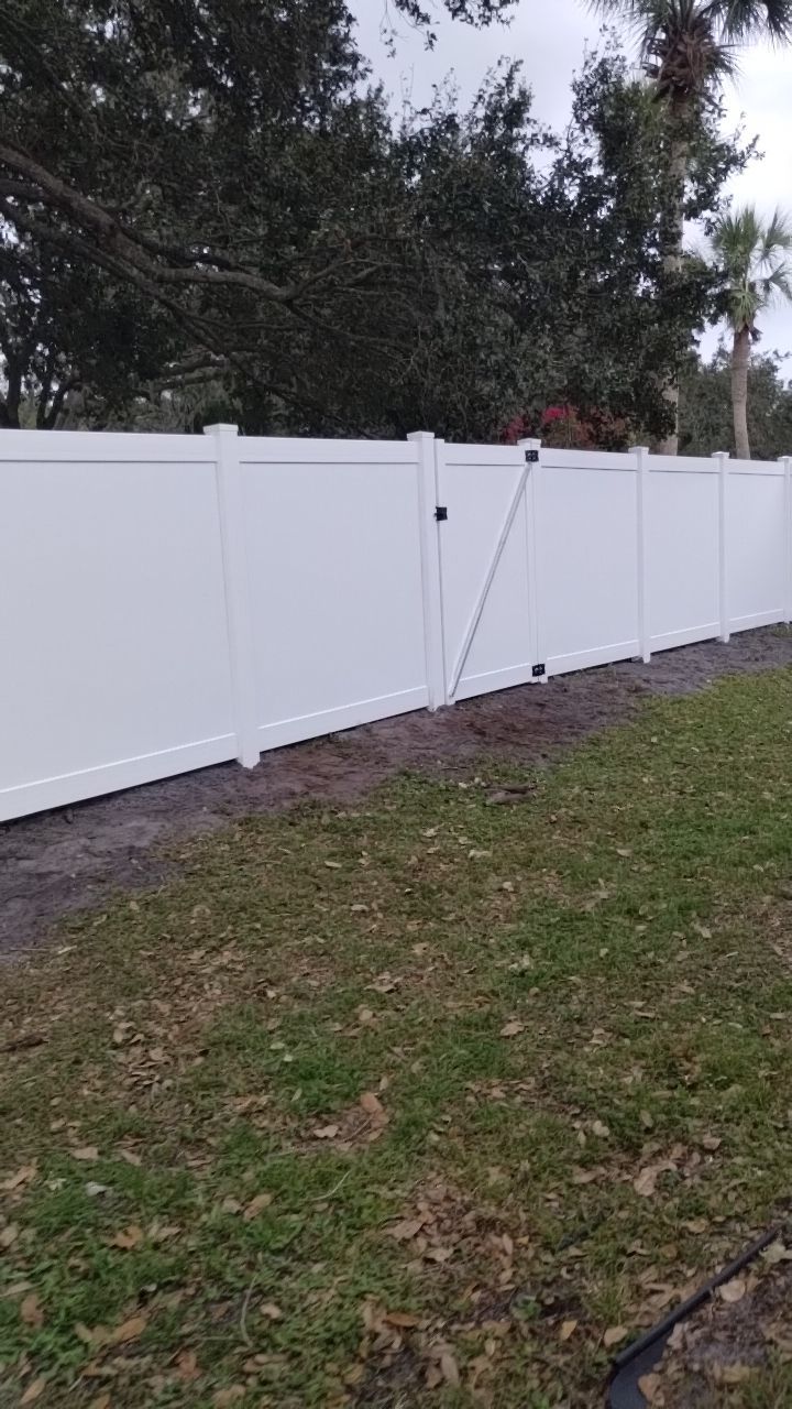 White Vinyl Privacy Fence Installation In North Port, FL by Asap fence and gates, LLC