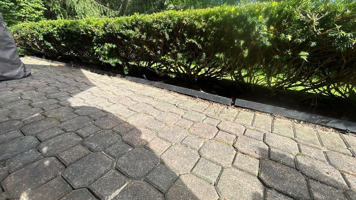 Brick paver repair, clean and seal by Northern Power Washing LLC.