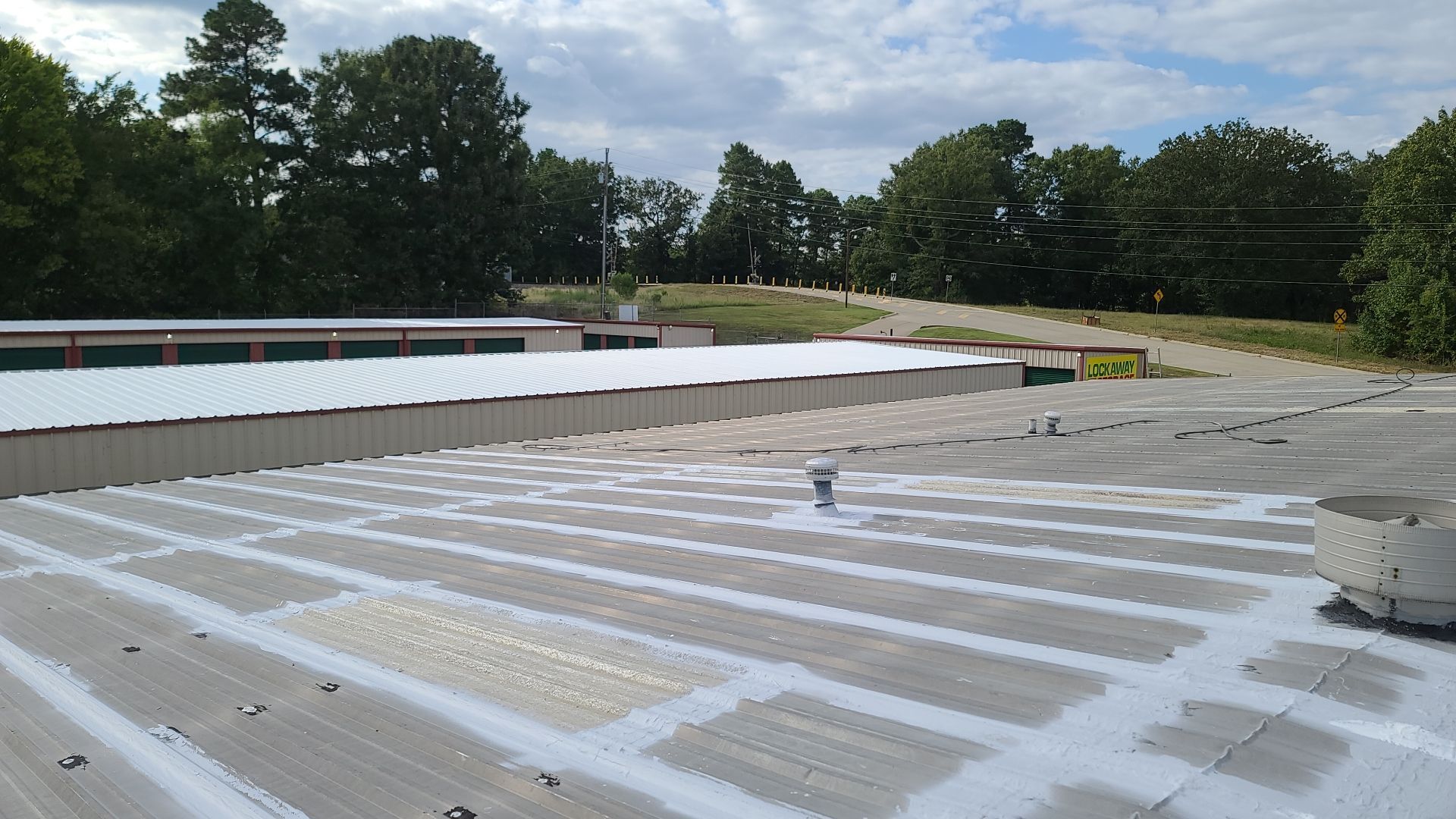 Commercial Metal Restoration System using Aldocoat Coatings by Hostetler Roofing