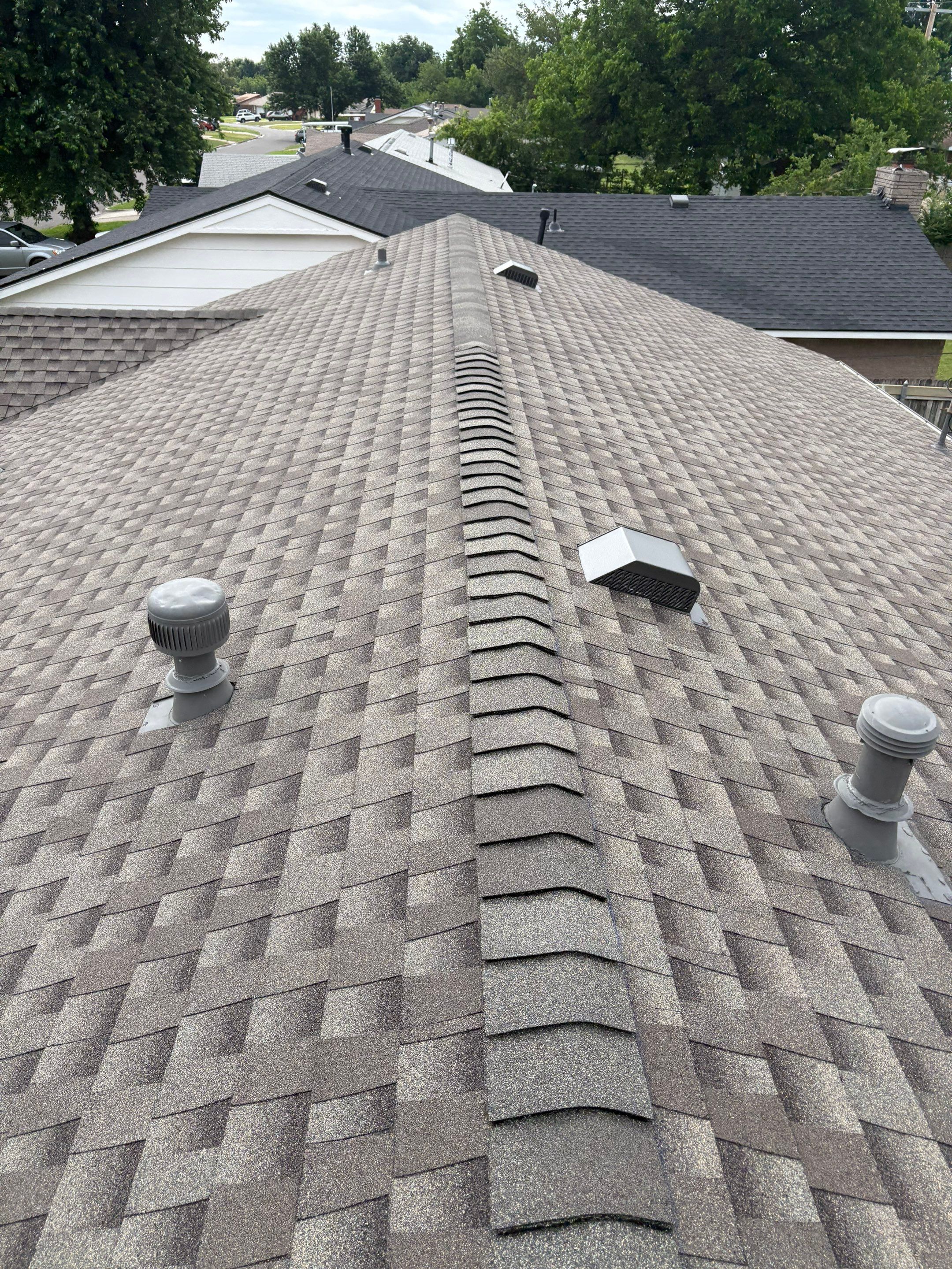 roof replacement & gutter installation in Moore by McCann's Roofing and Construction